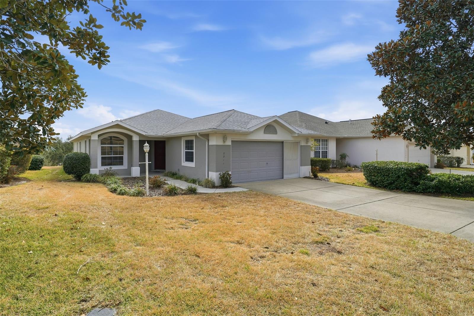 Welcome home to Florida’s Nature Coast area in beautiful Citrus County in this loved and cared for maintenance-free villa in the gated community of Citrus Hills at Brentwood! The lawn care is included as well as the building maintenance which includes roof (replaced in 2022) and exterior painting. The water heater was new in 2023 and the HVAC in 2016. This villa has an office/den or 3rd bedroom with 2 full baths and an open floorplan concept with kitchen, dining and great room areas with open golf course views! You’ll feel like you live in a resort when you open the triple pocket sliding doors wide, from the great room, to relax on your screened-in lanai overlooking the spectacular view! The kitchen boasts a breakfast bar, gorgeous counter tops, pantry, wine rack and is open to the great room so you never feel tucked away in the kitchen! Double doors to the office/den with a small closet and an alcove area for a desk or even a dresser if you’d like to make it a guest or third bedroom! A door from this room even leads to the guest bath so it would serve well as a bedroom/guest room suite! The guest bath has a tub/shower combination and the primary bath, off the same hallway between the second bedroom and primary bedroom, has dual sinks, linen closet and a shower. The primary bedroom has a couple of small alcoves, a walk-in closet and sliders to the lanai. Flooring is carpet in the bedrooms and a stunning wood-plank patterned ceramic throughout the living areas for easy care! The spacious 2-car garage has extra storage space with built-in cabinets and pull-down stairs to attic space.  Come and join the Citrus Hills-Brentwood family and indulge yourself with all the amenities and activities they offer from golfing to tennis or pickleball to the amazing fitness centers, pools, spas, programs and more! For all of you fishing and boating enthusiasts, all of this is located just minutes to Crystal River where you can easily access the Gulf and even swim with the manatee! The gorgeous Rainbow Springs area, in Dunnellon, is just minutes away, as well as the renowned World Equestrian Center in Ocala!  You will also be near shopping, medical facilities, great restaurants and have nearby access to the 47-mile paved Withlacoochee State Trail for walking or cycling AND the Suncoast Parkway for an easy hour commute to the Tampa International Airport! Come live the Florida Lifestyle with us!
