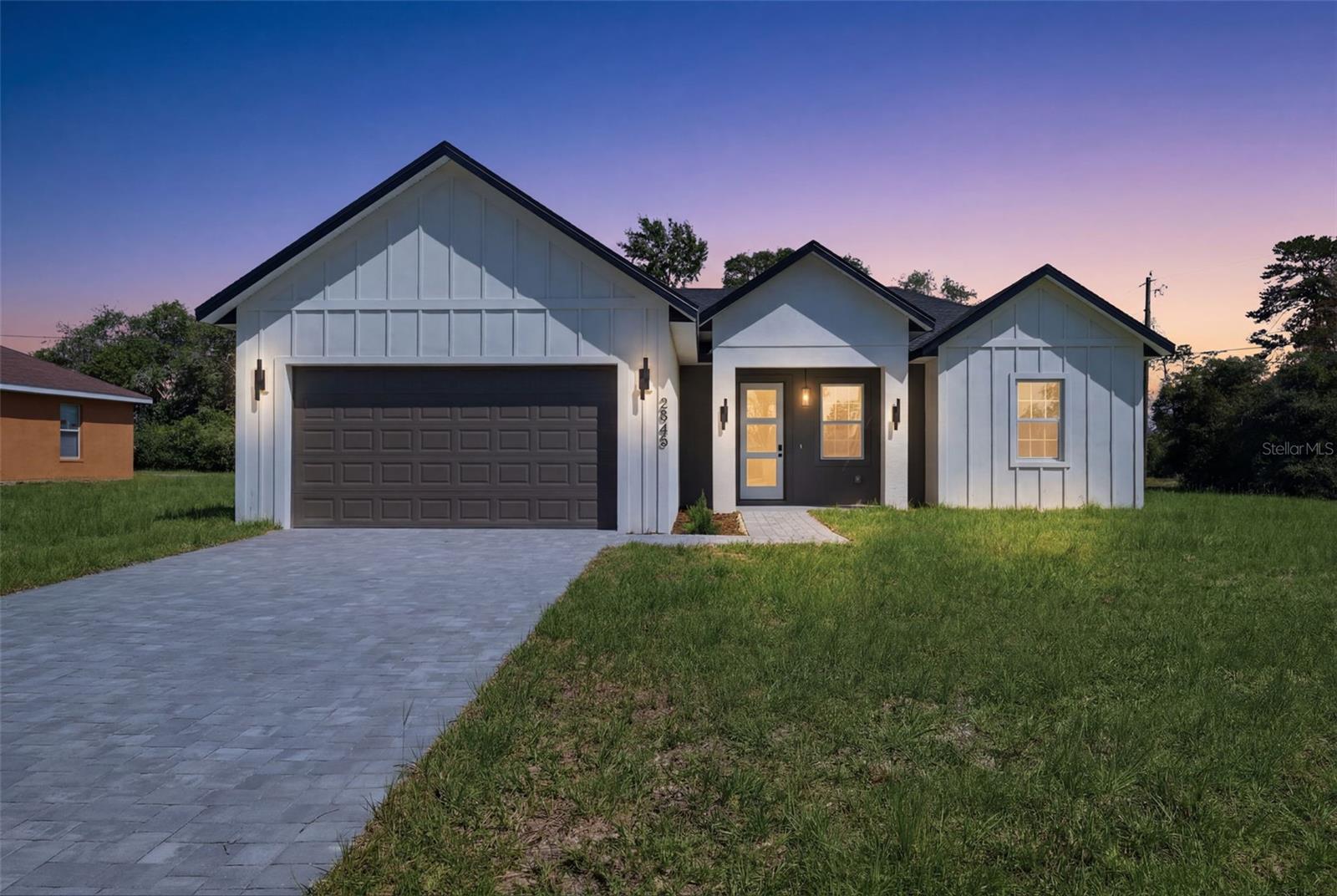Brand-New Corner Lot Home in Ocala – Modern Comfort and Exceptional Location

Welcome to this beautiful new construction home situated on a desirable corner lot in Ocala. Designed with both style and functionality in mind, this stunning residence offers 4 spacious bedrooms, 2 full bathrooms, and an open-concept floor plan that creates the perfect environment for everyday living and entertaining.

The expansive living and dining areas provide plenty of room for family gatherings and special occasions, while the thoughtfully designed kitchen serves as the heart of the home. Featuring solid wood cabinetry, elegant stone countertops, and a full set of included appliances, this kitchen combines quality craftsmanship with modern convenience.

The private primary suite offers a relaxing retreat, complete with a generous walk-in closet and a well-appointed en-suite bathroom. The additional bedrooms are comfortably sized and feature built-in closets, providing ample storage for family members and guests.

A spacious attached 2-car garage adds convenience and extra storage space, while the corner lot location enhances curb appeal and offers additional yard space and privacy.

Ideally located near major roadways, shopping, dining, and highly regarded schools, this home provides easy access to everything Ocala has to provide while maintaining the comfort of a residential neighborhood.

Don't miss this opportunity to own a brand-new home that combines quality construction, modern finishes, and an outstanding location. Schedule your private showing today and discover all the features this exceptional property has to provide.