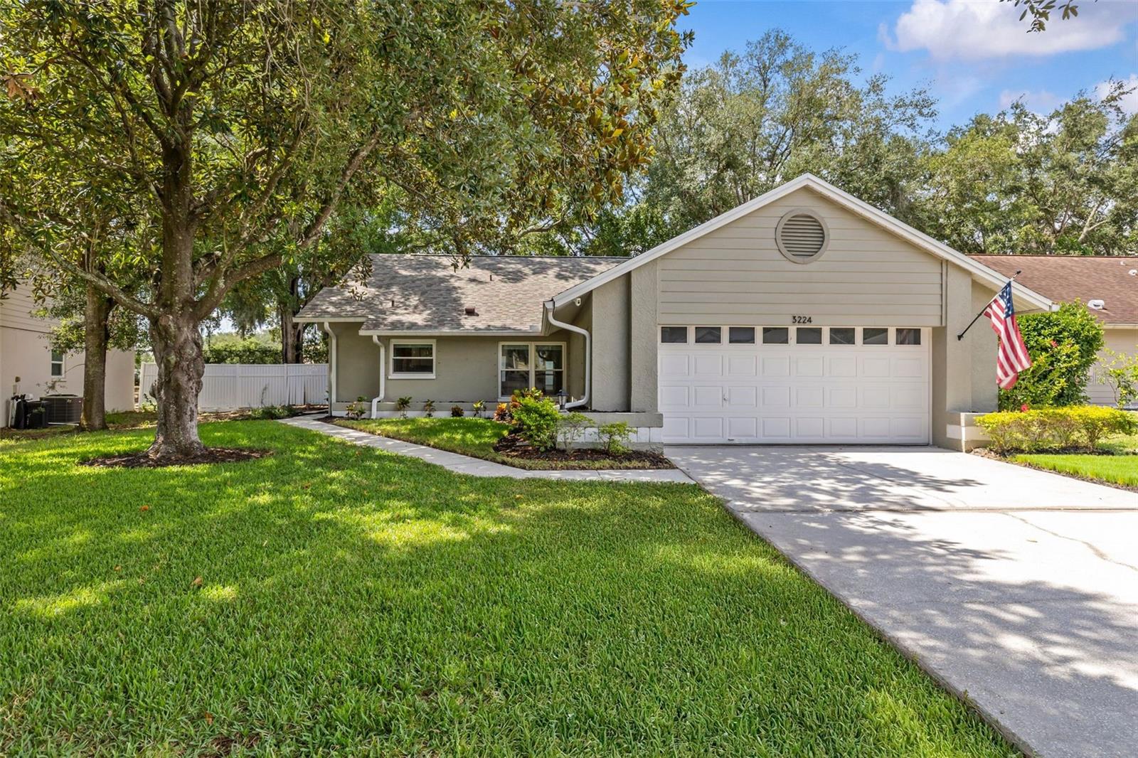 Virtually Staged. Nestled in the sought-after Hamlet at Bentley Park community, this beautifully maintained, move-in-ready 3-bedroom, 2-bathroom home with a 2-car garage offers the perfect blend of comfort, style, and peace of mind. Located in Flood Zone X and a NON-EVACUATION ZONE, this home provides additional peace of mind. Major improvements have already been completed, including a BRAND NEW ROOF installed in May 2026, a 2023 A/C system, and a beautifully remodeled primary bathroom completed in 2023.

Inside, soaring cathedral ceilings create a bright and spacious atmosphere filled with natural light. 

Step outside to enjoy the screened lanai, perfect for morning coffee, outdoor dining, or relaxing year-round. The backyard fire pit area creates an inviting setting for gathering with family and friends and enjoying Florida's cooler evenings.

Residents of Bentley Park enjoy access to a community pool, tennis courts, and a park. Located within Palm Harbor's highly rated school district and just minutes from Gulf beaches, shopping, dining, parks, and everyday conveniences, this home offers an exceptional Florida lifestyle in one of the area's most desirable communities.

Don't miss your opportunity to own this beautiful Palm Harbor home with major improvements already completed.