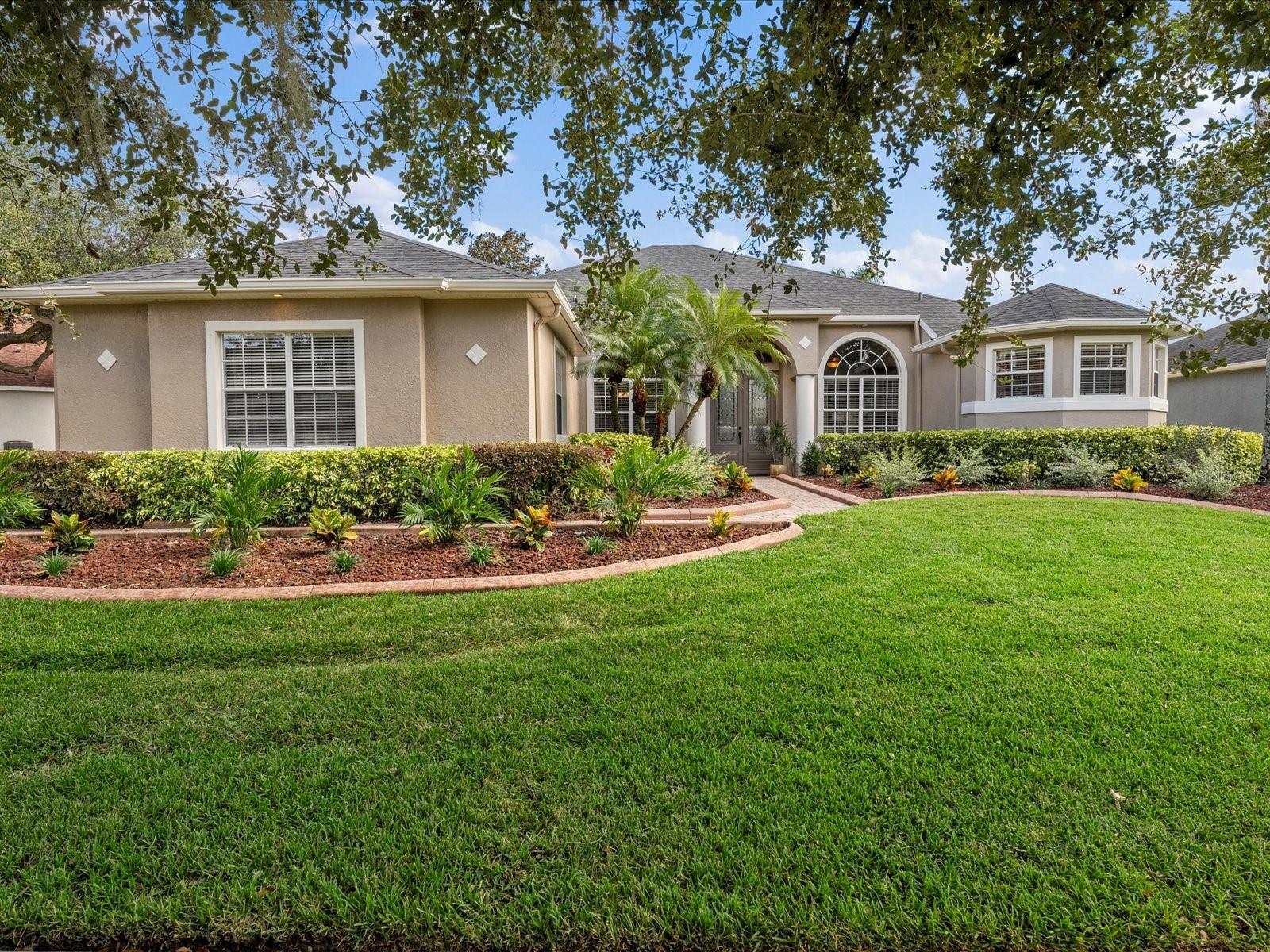 Immaculate, move-in ready 4 bedroom, 3 bath, POOL home with an ADDITIONAL OFFICE space, and a 2 car side-entry garage, located in the sought after neighborhood of Live Oak Reserve in Oviedo.

Walking into this home is a like breath of fresh air! You’ll love the crown molding, 12 foot ceilings and the abundance of natural light. The 3 way split floor plan is perfect for family as well as guests, so everyone has their own space and privacy. 

The pavered walkway leads you to the beautiful double front doors, as a large foyer welcomes inside, with a formal living room and dining room. The office is to the right as you walk in, with beautiful solid wood, custom built-in desks and shelving. Further down the hall you will find double doors that open to the spacious primary bedroom, with 2 walk-in closets and views of the pool and covered lanai. Your spa-like ensuite bathroom features a large walk-in shower with double shower heads, a garden tub, and two separate vanities and a tray ceiling. 

At the heart of the home is the expansive gourmet kitchen with 42” cabinetry with under cabinet lighting, granite countertops, tile backsplash, new smart black stainless steel appliances, a center island, closet pantry, desk space and breakfast bar, overlooking the family room, making this home perfect for entertaining. The family room features gorgeous built-ins and surround sound speakers, with sliders that lead outside onto your covered lanai, with a sparkling pool and a fenced in yard with plenty of green space.

Off of the family room is a guest bedroom with walk-in closet, a full bath and access to outside. On the same side of the home, but separated by the kitchen, are the two additional secondary bedrooms, separated by another full bath. 

The indoor utility room has cabinetry for additional storage as well as a sink, and is located off of the garage, with custom built-in cabinetry and a NEW WATER HEATER. The ROOF was replaced in 2020, and the HVAC was replaced in 2017. The landscaping has been refreshed, and the home has new exterior paint as well. This home shows beautifully and has been meticulously maintained. Zoned for A-Rated schools, located just a short drive to shops, restaurants and all major roadways, you won’t be disappointed!
