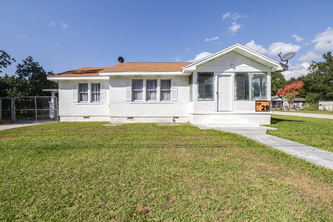 Looking for a home with a pool and an in-law suite? This is it! This 3-bedroom, 1-bathroom home, located in the heart of Fort Meade, features a large mother-in-law suite with plenty of space for extended family and a nice in-ground pool to entertain everyone. Additionally, this home sits on a large corner lot that is just under 1/3 of an acre. As you approach the home, you will notice a good-looking architectural shingle roof that was installed in 2022. Upon entry, you will see a quaint Florida room that leads into the main part of the home. Upon entering the main part of the home, you will notice new laminate flooring and a freshly painted interior. You will see that the living room leads into a dining room area that overlooks a nice-sized kitchen area with plenty of space to cook your favorite meals. Off of the living room on the opposite side of the home, you will find all 3 bedrooms and the bathroom, which features a nice step-in shower. The rear of the home has a large wood porch, big enough for plenty of family and friends. As you step out into the fenced backyard, you will walk past the nice in-ground pool and directly into the large mother-in-law suite. The air-conditioned mother-in-law suite features a large living space, 1 bed, 1 bath, and a bonus room, including a kitchen with a stove, refrigerator, and pantry space. The backyard also features a metal storage shed that has electricity hooked up inside. This home, located centrally in Fort Meade, is near most of the local schools, restaurants, and shopping. Additionally, most of central Florida's major attractions and beaches are not too far away! Do not hesitate; schedule your showing today!