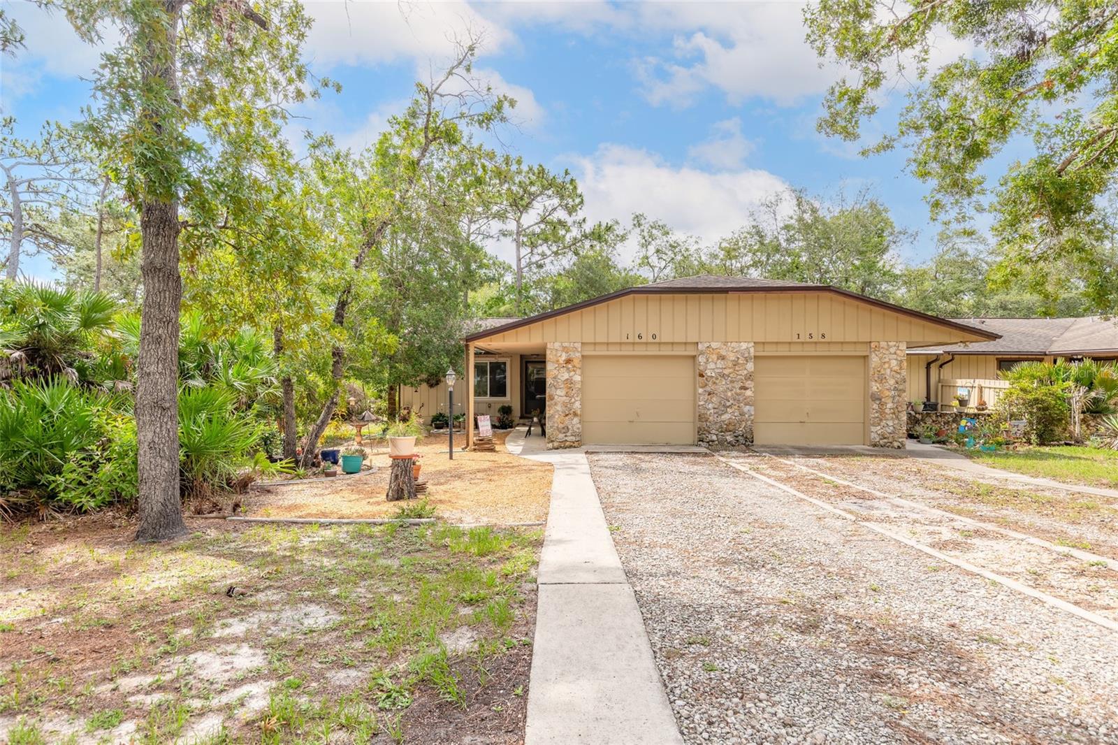 Welcome to easy Florida living in this beautifully maintained 2-bedroom, 2-bath patio home featuring a desirable open-concept floor plan and attached 1-car garage. The spacious living area is enhanced by luxury vinyl laminate flooring and a cozy fireplace, creating a warm and inviting atmosphere for everyday living and entertaining.
The split-bedroom layout offers privacy for both owners and guests, while the eat-in kitchen provides plenty of space for casual dining. Step outside to the large screened porch overlooking a private wooded setting, offering the perfect place to enjoy your morning coffee or unwind at the end of the day.Situated on a premium corner lot adjacent to a peaceful wooded area, this home is located in a sought-after 55+ community loaded with amenities. Residents enjoy a heated community pool, approximately 4 miles of walking trails, lawn maintenance, Wi-Fi, and cable—all included with an incredibly low monthly maintenance fee of just $146.
Conveniently located near shopping, restaurants, medical facilities, along with the  beaches an everyday conveniences, this home offers the perfect combination of comfort, privacy, and low-maintenance living.