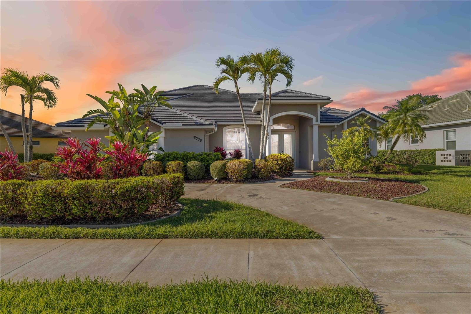 One or more photo(s) was virtually staged. Rare. Refined. Ready.
This is the home Sarasota buyers have been waiting for a meticulously maintained, one-owner estate in the coveted gated enclave of Laurel Lakes, where properties of this caliber almost never come to market.
Set on an oversized lot approaching a third of an acre, the panoramic lake views are nothing short of breathtaking morning coffee on the lanai, sunset dinners al fresco, every day feels like a retreat
What Makes This Home Exceptional. A brand-new barrel tile roof (an $65,000 improvement, completed August 2025) means the next owner inherits zero deferred maintenance and maximum peace of mind a rare gift in today's market. Inside, the thoughtfully renovated chef's kitchen is the heart of the home: natural gas cooktop, gleaming new quartz countertops, an expansive center island, and an open flow into the spacious family room that makes entertaining effortless. The layout is uncommonly versatile 6 bedrooms plus a 17×15 bonus room (ideal as a 6th bedroom, home office, or media suite), 4 full baths, formal living and dining rooms, and a spa-inspired primary suite featuring dual vanities, a walk-in shower, jetted soaking tub, and a walk-in closet that will impress even the most selective buyer.

Live Like Every Day Is a Vacation

Step through the oversized screened lanai into your private outdoor oasis — a summer kitchen, extended cage, and sweeping lake views that never get old. The circular driveway and 2.5-car garage ensure there's room for every vehicle and every guest.

A Community That Completes the Lifestyle

Laurel Lakes delivers resort-style amenities at a fraction of the cost: heated pool & spa, fitness center, pickleball courts, and a clubhouse — all with low HOA fees and no CDD. This is the sweet spot buyers rarely find.

And the location? Minutes from Siesta Key Beach (consistently ranked among the nation's best), A-rated Tatum Elementary School, Rothenbach Park, upscale dining, and a brand-new Publix just five minutes away.

The Bottom Line

At $237/SF for a move-in ready, upgraded, gated-community home in one of Sarasota's most sought-after corridors — this is exceptional value that is difficult to replicate. The home is vacant, immaculate, and priced to move.  Design Services are complilmentary.  All items in mood boards may be purchased

Don't wait. Opportunities like this don't linger.