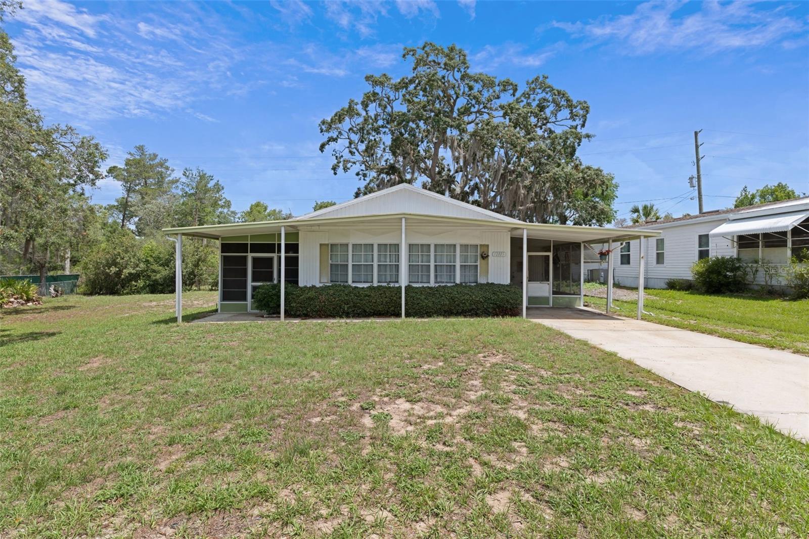 This 2-bedroom, 2-bathroom home features a rare double lot with tons of yard space and a newer roof (2024) already in place. The home needs TLC and is priced accordingly--perfect for handymen, investors, or anyone looking to customize their own space.  Located in the vibrant & active 55+ High Point Golf Community that offers tons of amenities such as Golf, tennis, pickleball, heated pool, social events and so much more. High Point is located close to shopping, restaurants, entertainment, and medical facilities. Low HOA fees and you OWN YOUR OWN LAND.