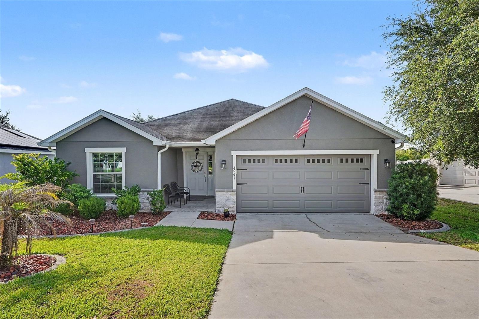 SOLAR LEASE MUST BE ASSUMED BY BUYER. Welcome to 2061 Nighthawk Drive in Haines City, where space, comfort, and convenience come together on an impressive one-third acre corner lot. The home is equipped with leased solar panels, and the solar lease will need to be assumed by the new owner as part of the purchase.

Nestled within a quiet neighborhood, this well-maintained home offers the perfect blend of privacy and accessibility, with shopping, dining, entertainment, and everyday conveniences just minutes away.

Step inside to discover a bright, open-concept floor plan filled with natural light and designed for both everyday living and entertaining. The spacious living and dining areas flow seamlessly into the kitchen, creating a welcoming space for gatherings with family and friends. The kitchen features stainless steel appliances, ample cabinet storage, generous counter space, and a functional layout that makes meal preparation effortless.

The primary suite offers a peaceful retreat with a tray ceiling, walk-in closet, and private en-suite bathroom complete with dual vanities and a spacious shower. Additional bedrooms provide flexibility for guests, family members, a home office, or hobby space.

Situated on a sprawling corner lot of approximately one-third of an acre, the outdoor space is one of this home's standout features. The fully fenced backyard provides endless possibilities, whether you're envisioning a future pool, outdoor entertaining area, garden, or simply enjoying the extra space and privacy. A covered screened lanai offers the perfect place to relax and enjoy Florida living year-round.

Conveniently located near shopping, dining, entertainment, and major roadways, this property combines a spacious homesite with everyday convenience. Buyers should note that the home's solar panel system is leased and the lease must be assumed by the purchaser at closing.

Schedule your private showing today and see everything 2061 Nighthawk Drive has to offer.