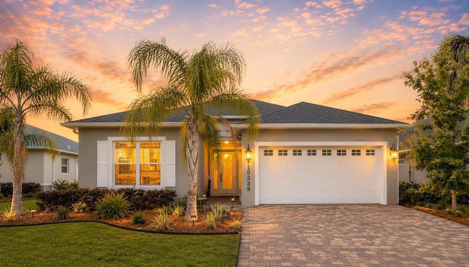 RARE Grand Flamingo Model Built in 2022 with NO Rear Neighbors in Lakeside Landings! 

The only thing missing from this Grand Flamingo is a tropical drink with a tiny umbrella in it! 

Tucked inside the highly desirable gated community of Lakeside Landings, this rare Grand Flamingo model offers 2,003 square feet of beautifully upgraded living space, 3 bedrooms, 2 bathrooms, and one feature buyers are always searching for: NO REAR NEIGHBORS.

From the moment you arrive, the brick paver driveway, immaculate landscaping, and undeniable curb appeal make it clear that this home is something special. Step through the welcoming foyer and prepare to fall in love with soaring cathedral ceilings, stunning porcelain tile plank flooring throughout, modern lighting, designer-inspired finishes, sparkling quartz countertops, bright cabinetry, and a massive kitchen island that's practically begging to host your next gathering.

And then there's the LIFESTYLE...

Imagine starting your mornings with a workout at the fitness center, spending afternoons poolside at the resort-style clubhouse, squeezing in a pickleball match with friends, and ending the day with dinner and live music at nearby Lake Sumter Landing—just minutes away.

Lakeside Landings is packed with amenities including two pools, hot tub, tennis courts, pickleball, billiards, dance hall, dog parks, playground, outdoor fitness park, and a calendar full of social events. Better yet, the HOA covers most lawn maintenance, landscaping, irrigation, exterior pest control, neighborhood security, and amenity access. 

Translation? Less work. More living.

Stylish. Spacious. Move-in ready. And rare for a reason. Don't let this Grand Flamingo fly away before you see it for yourself!