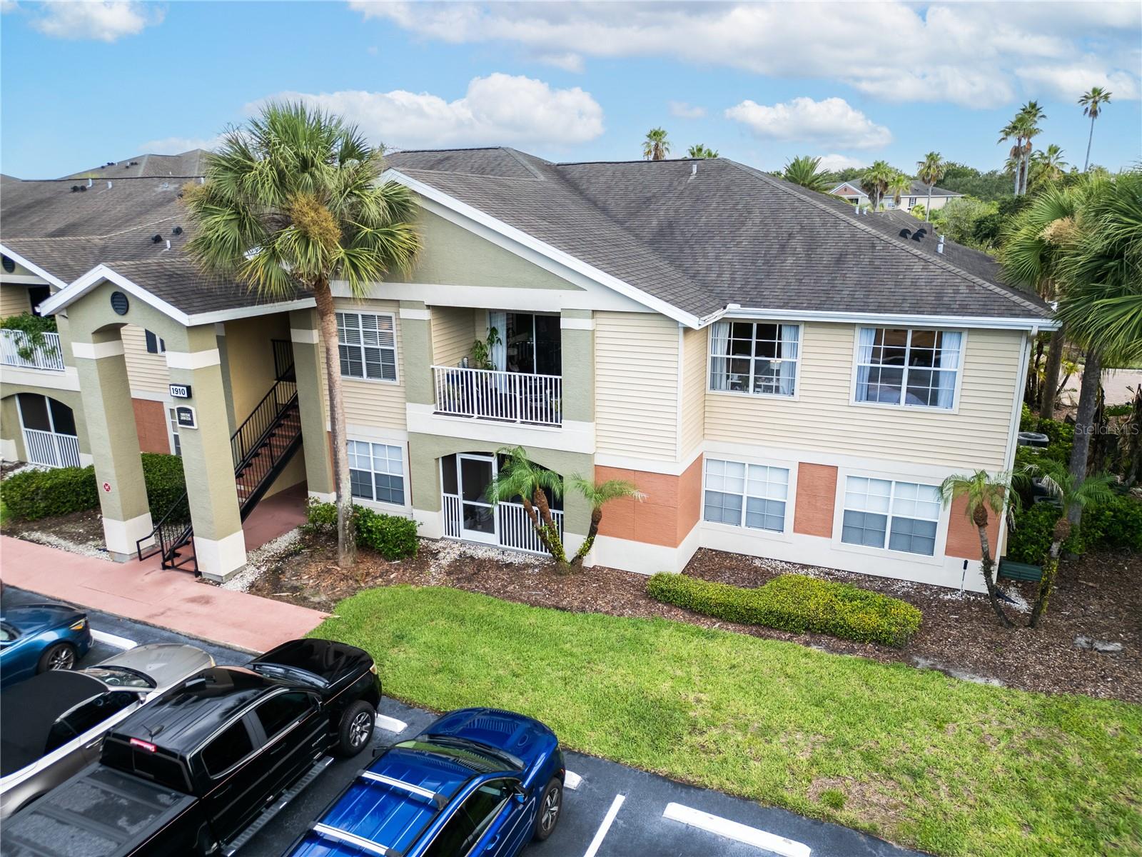 Welcome to this spacious 3-bedroom, 2-bath condo in the desirable Villas at Lakeside community, located right in the heart of Oviedo. A standout within the community, this 2nd-floor, top-floor corner unit is set along the treeline and offers peaceful treeline views, giving the home an added sense of privacy and natural light. From the moment you enter, you’ll notice the warm wood-tone waterproof luxury laminate flooring that flows through the main living areas, bedrooms, closets, and bathrooms, creating a clean and cohesive feel throughout the home.

The open-concept kitchen, dining, and living area offers an easy everyday layout, with vaulted ceilings in the living room adding an airy, open feel. The kitchen features a breakfast bar overlooking the main living space, making it ideal for casual dining, entertaining, or staying connected while cooking. Just off the living area, step outside to a large private balcony with wood flooring and treeline views, plus an exterior storage closet for added convenience.

The thoughtful split floor plan places the large primary suite on one side of the home, separate from the two secondary bedrooms and guest bath. All three bedrooms are generously sized, and each bedroom features its own large walk-in closet, offering excellent storage throughout.

Recent updates include a new interior and exterior AC system in 2024, new flooring in 2024, new water heater in 2024, new bathroom vanities in 2024, fresh interior paint in 2024, new baseboards in 2024, updated switch covers and electrical outlet plates in 2024, refinished bathroom tile in 2026, and new shower finish kits in both bathrooms in 2026.

Villas at Lakeside offers a wonderful community setting with a large pond and fountain, walking path, playground, clubhouse, movie theater, tennis courts, and a large community pool that was resurfaced/renovated in 2026. The location is hard to beat, with UCF approximately 4 miles away, Oviedo Mall about 1 mile away, Oviedo on the Park approximately 2 miles away, and Orlando International Airport approximately 16 miles away.

Whether you’re looking for a primary residence, a low-maintenance Oviedo home, or an investment opportunity, this condo offers space, updates, amenities, and convenience in one of Seminole County’s most sought-after areas. Zoned for highly rated Seminole County schools. Schedule your private showing today.