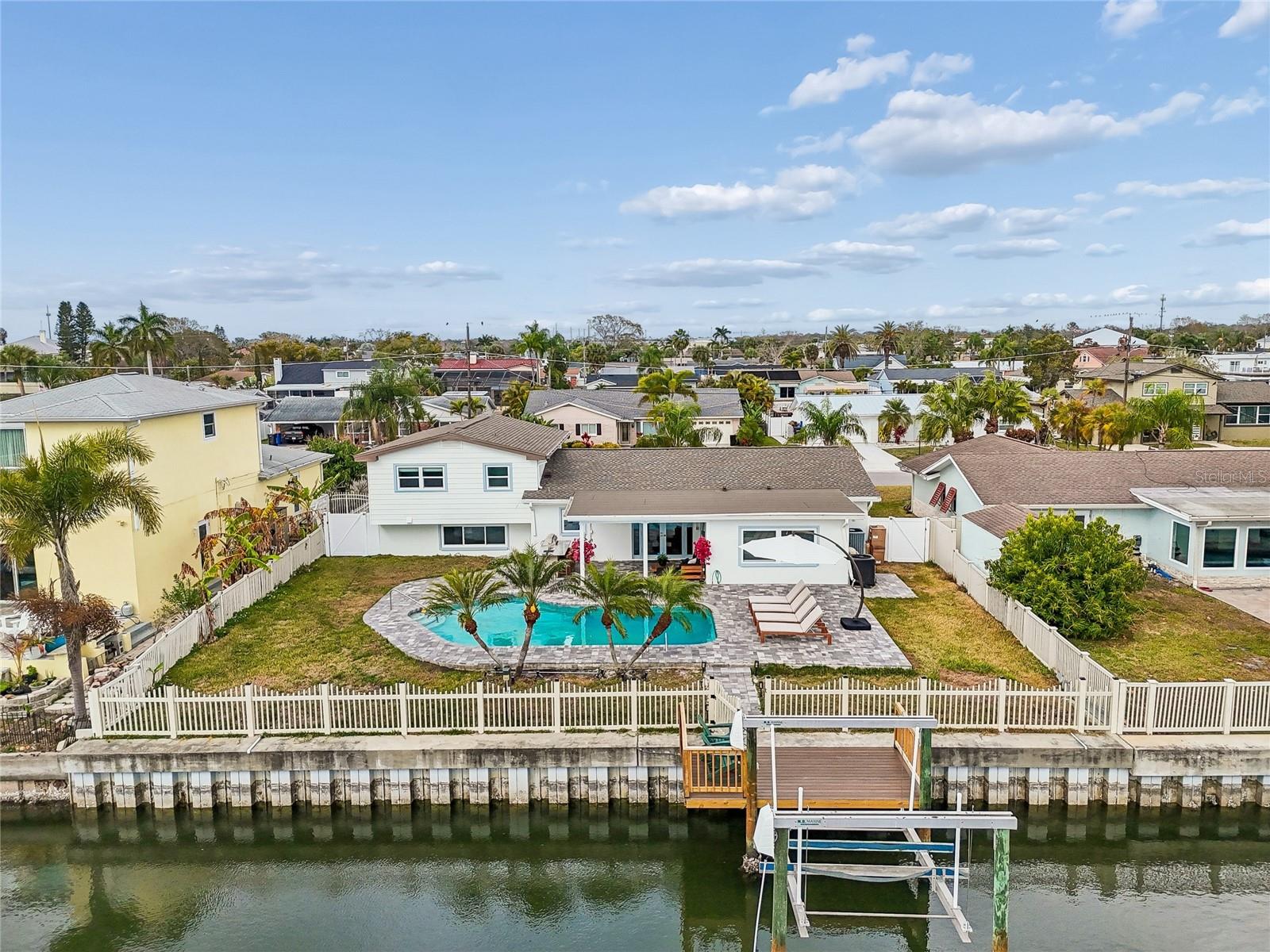 WATERFRONT POOL HOME WITH DIRECT TAMPA BAY ACCESS

Rare opportunity to own a beautifully updated waterfront pool home in Bay Crest Park with direct access to Tampa Bay. Situated on a canal with a seawall, dock, and a heated private pool, this move-in-ready property delivers the ultimate Florida waterfront lifestyle just minutes from Tampa International Airport, Westshore, Rocky Point, shopping, dining, and entertainment.

Inside, you’ll find a bright, open-concept layout designed for both everyday living and entertaining. The heart of the home is a custom-designed waterfront kitchen featuring stunning Taj Mahal quartzite countertops, extensive custom cabinetry, premium appliances, abundant storage, and an oversized island perfect for gathering with family and friends. Large new windows fill the home with natural light while showcasing water views throughout.

The flexible floor plan offers multiple living areas and bonus spaces ideal for home offices, guest accommodations, fitness rooms, hobby spaces, or multi-generational living. The spacious primary suite serves as a private retreat, while updated finishes throughout create a seamless blend of comfort, style, and functionality.

Step outside to your private waterfront oasis, complete with a sparkling pool, dock, seawall, and easy access to Tampa Bay. Launch your boat from your backyard, spend the day on the water, then return home to enjoy sunset views, fishing, paddleboarding, or relaxing poolside.

Major updates provide peace of mind, including a new roof (2023), new windows, and numerous interior improvements (no stone left unturned). Bay Crest residents enjoy no HOA fees, no deed restrictions, and access to a private neighborhood boat ramp.

Currently operating as a successful short-term rental, the property generated over $87,000 in just six months, with more on the books!  Detailed income history is available. Whether you’re searching for a primary residence, vacation home, or turnkey investment opportunity, this property offers exceptional flexibility and value.

One of the few move-in-ready, direct-access waterfront pool homes available on the Westshore corridor under $900,000

Property available furnished or unfurnished, with furnishings negotiable separately. Bitcoin accepted as a form of payment.