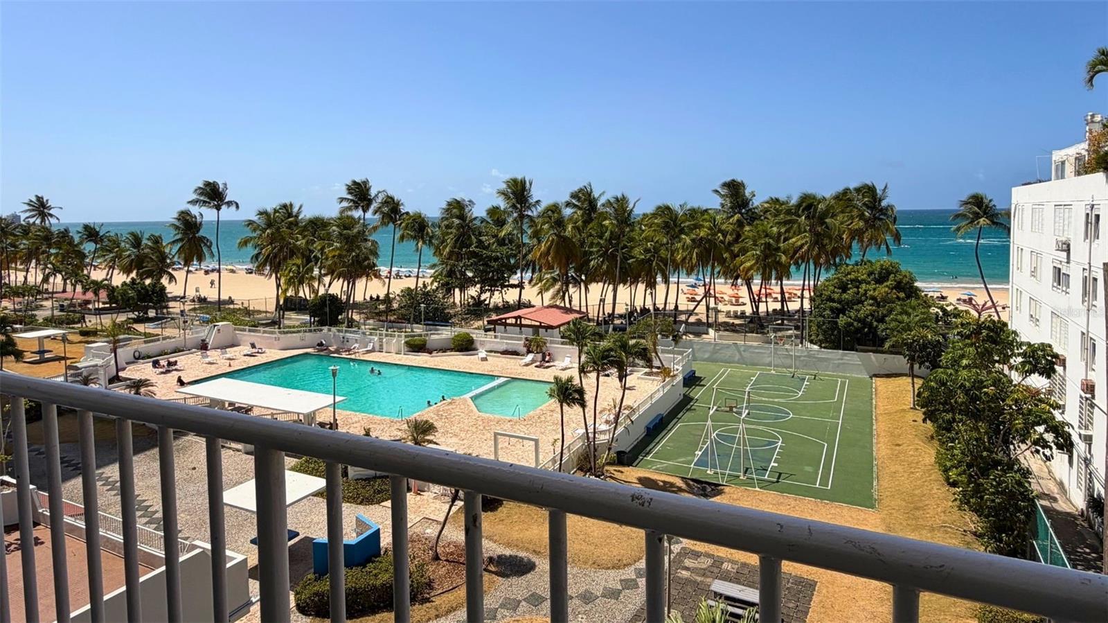 Experience coastal living at its finest in Apartment 508 at Marbella del Caribe Este, ideally located in the heart of Isla Verde, Carolina. This beautiful apartment offers a spectacular ocean and beach view, creating the perfect setting to enjoy the Caribbean breeze, stunning sunrises, and a relaxed beachfront lifestyle. Situated on Av. Isla Verde, the property provides convenient access to restaurants, hotels, shopping, entertainment, and the Luis Muñoz Marín International Airport. The condominium offers desirable amenities including a swimming pool and recreational areas, making it an excellent option for a primary residence, vacation home, or investment opportunity. The apartment is currently operating as a very active Airbnb, adding strong appeal for buyers looking for income-producing potential in one of Puerto Rico’s most attractive coastal locations. A rare opportunity to own in one of Isla Verde’s most desirable beachfront communities.