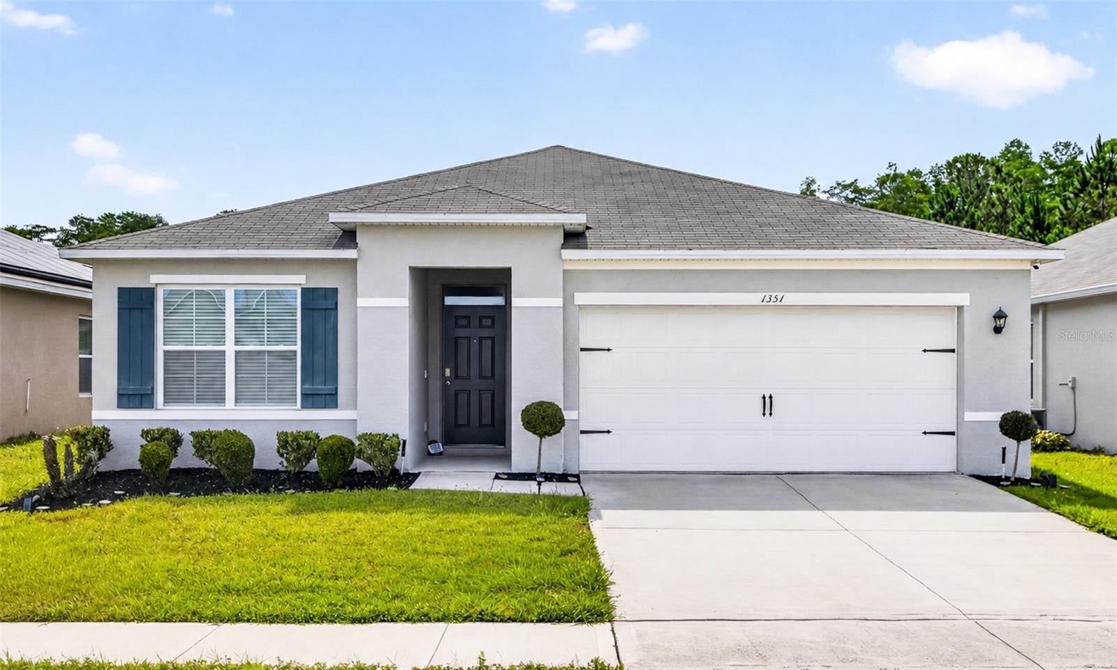 Welcome to this immaculate, move-in ready 3BR/2BA home (built 2021) spanning 1,690 sq. ft. in the highly desirable area of North Davenport! This home is the true definition of being able to have your cake and eat it too here in Central Florida. From the moment you step inside, you'll love the bright, open-concept split floor plan featuring recessed lighting, fresh interior paint, a built-in water filtration system and PAID OFF solar panels. The chef's dream kitchen serves as the heart of the home, boasting an oversized island, stainless steel appliances, and a huge walk-in pantry, while the private primary suite is tucked away at the back of the home, offering beautiful views of a backyard conservation area, a massive walk-in closet, and a luxurious en-suite with a dual-sink vanity and walk-in shower. Nestled in a vibrant community that features a beautiful pool and playground, the community is perfectly situated directly across the street from a major supermarket chain, plenty of dining options, and the local elementary school, which is within easy walkable distance. As an added bonus, the beautiful furniture in the home is negotiable, making your move even easier! Plus, you are in the ultimate Central Florida location for commuting and entertainment: just 18 miles from Disney, 24 miles from Universal, 30 miles from MCO, 32 miles from downtown Orlando, and 60 miles from Tampa. All this property is missing if you, your family and the future memories you will create. This home will go FAST.