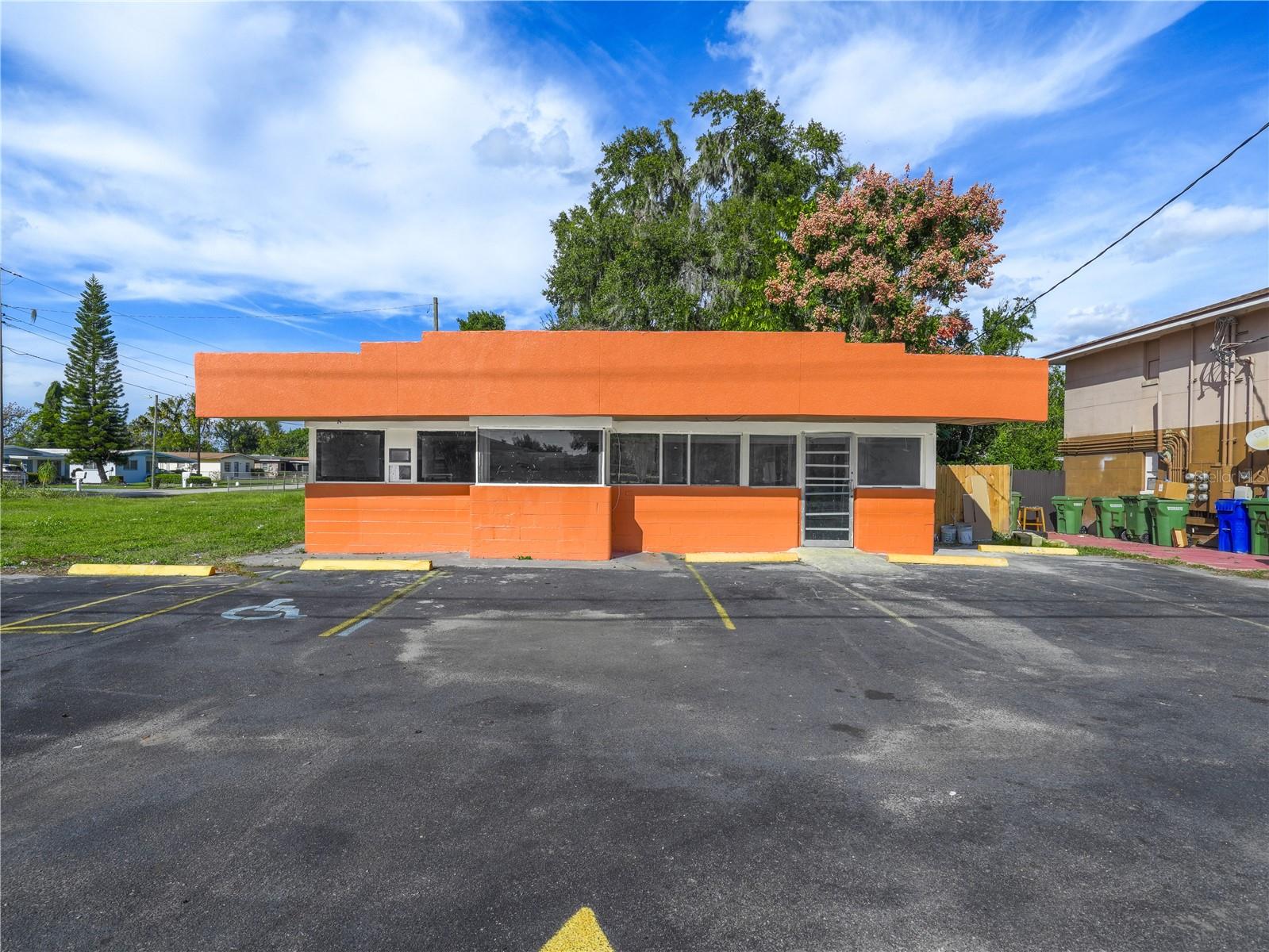 Situated in the heart of Florence Villa in Winter Haven, Florida, this charming restaurant/retail property is ideally located along Martin Luther King Boulevard, a well-traveled thoroughfare. The offering includes a fully equipped restaurant space featuring a commercial cooking hood, fire suppression system, and existing fixtures. A tenant is currently in place on a month-to-month lease, generating $2,500 per month in income and offering immediate cash flow or flexibility for an owner-user.

The building has been recently remodeled, with major upgrades completed in 2021, including a new roof and HVAC system, along with updated tile flooring and cosmetic improvements throughout.

Martin Luther King Boulevard serves as a key connector within Winter Haven, beginning as Buckeye Loop Road on the east side and transitioning into Havendale Boulevard at the 1st Street intersection. As Havendale Boulevard, it intersects with high-traffic Lake Alfred Road, providing convenient access north to US-92 and I-4, and south to Eagle Lake and Bartow.

The property benefits from strong local traffic generated by nearby Jewett Middle School and Jewett School of the Arts, creating consistent demand from school staff, students, and parents—an ideal setting for a neighborhood-focused restaurant or retail concept.