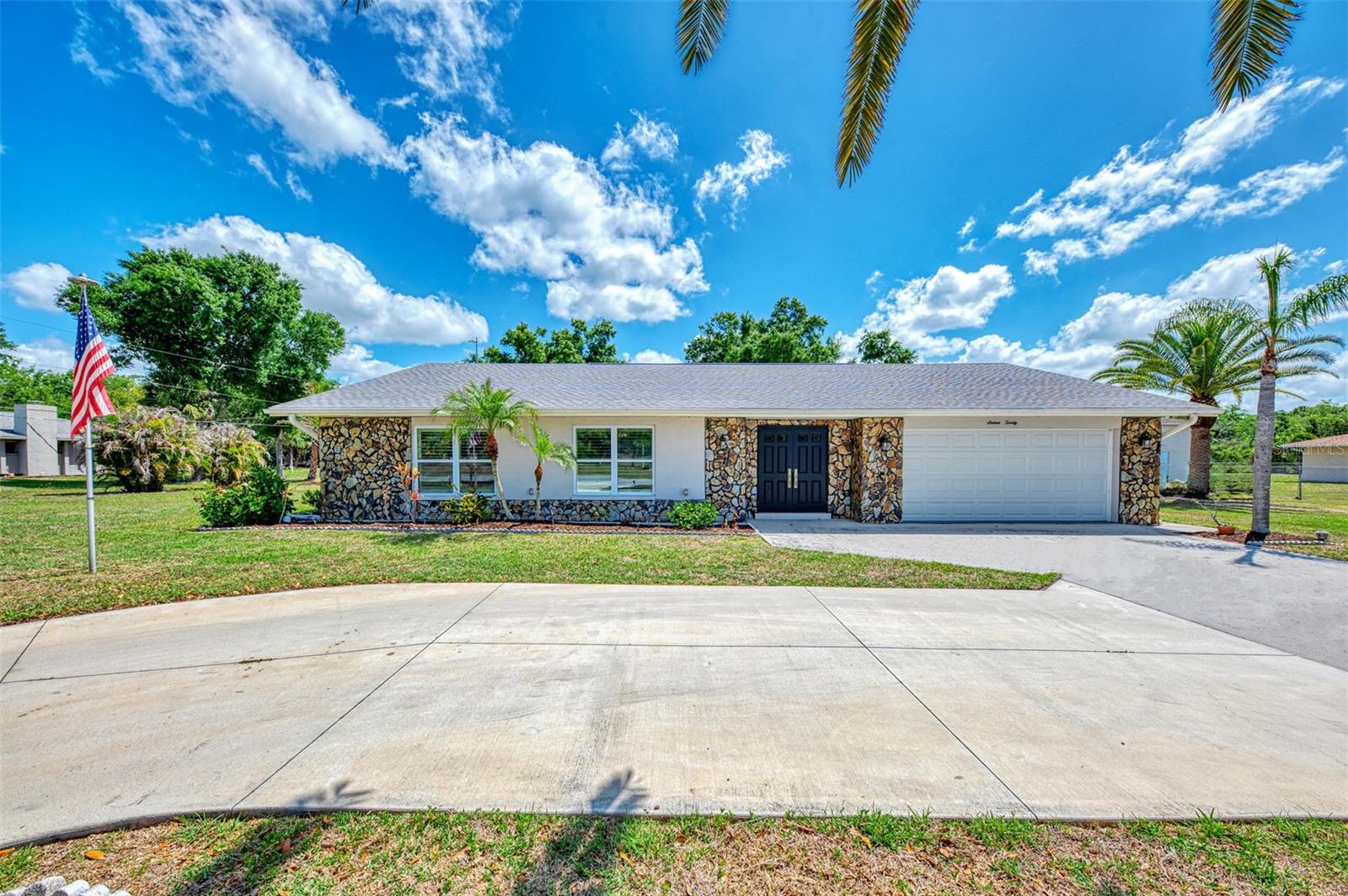 Priced to sell! Welcome to your private slice of paradise in highly sought after MISSION VALLEY ESTATES in Nokomis, Florida! With all your big ticket items taken care of, this is a MUST SEE!  This beautifully updated 3-bedroom, 2-bath concrete block home sits on OVER AN ACRE in this desirable non-HOA, no CDD neighborhood, offering space, flexibility, and modern upgrades throughout.


A circular driveway provides a welcoming entrance and ample parking. Inside, the home features ceramic tile flooring throughout, newer cabinetry, quartz countertops, stainless steel appliances, and modern recessed lighting for a clean, contemporary feel. The inviting family room overlooks the pool through a sliding glass door and showcases a stunning stone wood-burning fireplace—perfect for relaxing evenings.  
The primary suite offers a luxurious retreat with a beautifully updated bathroom featuring marble tile, double vessel sinks and a walk-in shower with floor-to-ceiling tiled walls. Bedrooms two and three are on the other side of the home and are connected by a convenient Jack-and-Jill bathroom, ideal for family or guests. Plantation shutters enhance most windows, while HURRICANE IMPACT WINDOWS throughout provide added protection and peace of mind.


Step outside to enjoy the expansive property and screened lanai, recently rescreened and painted. A standout feature is the detached pool house with an impact glass slider and mini-split air conditioner—perfect for a man cave, home office, yoga studio, or guest space with endless possibilities.  There is also a 10 X 20 storage shed for all your yard tools!

Ideally located near the Legacy Walking Trail and I-75, you’ll enjoy convenient access to beaches, dining, shopping, and more.

Major Updates Include: 2022: New Roof, New septic tank, Hot water heater, Lanai rescreened and painted.  2023: New AC and ductwork, New garage door, House rewired, Hurricane Slider installed on Pool House. 2024: Connected to county water.

With over an acre of land, no HOA restrictions, and extensive updates already completed, this property is a rare opportunity to enjoy Florida living with room to grow.