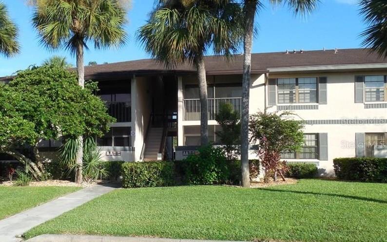 Lovely OAKS IV condominiums.  Centrally Located CLOSE to AMENITIES, Shopping, restaurants, YMCA and more.  Located in the heart of Port Charlotte, Oaks IV is nestled in its own little paradise. Once you enter Oaks IV, you are in awe of its Floridian oak trees and well-constructed, two-story, stucco buildings that are well positioned throughout the complex. The serenity that comes over you gives you the feeling that this is a place where you belong.  OAK TREES & lake views Line your way into this well maintained community.  Manager on site.  Community POOL & Amenities. Comfortable size 2nd Floor unit.  At this price put your PERSONAL touches!  Opens up to Living Room/Dining Room OPEN Floor Plan and Screened LANAI. Kitchen has breakfast bar.  Hall to Both BEDROOMS and Laundry Closet with NEWER Stackable Washer/Dryer.  Large Primary Bedroom with Bath.  Hall BATH has LARGE SHOWER stall and plenty of room.  Come CHECK it out!  GREAT PRICE!  GREAT OPPORTUNITY!  
(Buyer to verify all information & Dimensions)