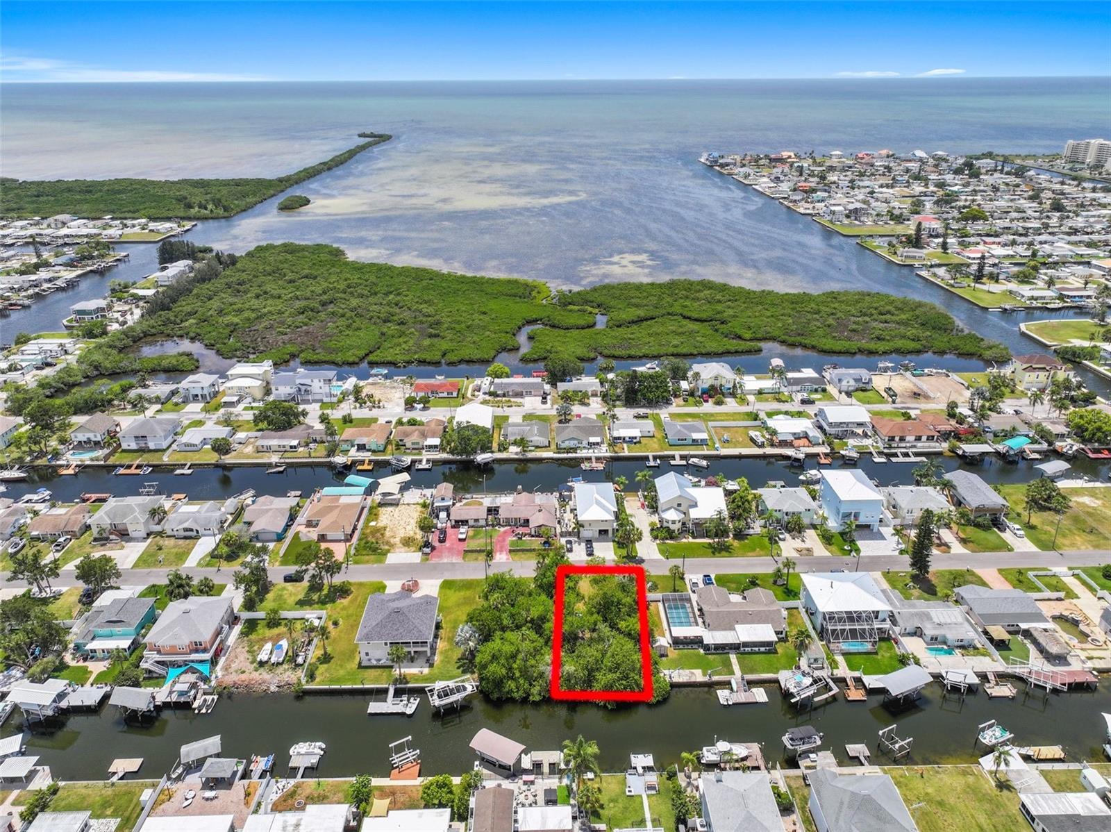 Build Your Dream Gulf Coast Boating Retreat – Direct Gulf Access Building Lot!

Discover the perfect place to build your dream waterfront home on this exceptional 59' x 100' residential building lot offering direct Gulf access with no fixed bridges and the potential for partial Gulf views. Whether you're planning a custom coastal retreat, vacation home, or waterfront investment, this property delivers the boating lifestyle you've been searching for.

An incredible bonus is that the adjoining lot is also available for purchase by the same owner at the same price, giving you the rare opportunity to own both properties and create an oversized waterfront estate or build two homes side by side for family, friends, or investment purposes.

With 59 feet of saltwater canal frontage, you'll enjoy quick, unrestricted access to the Gulf of Mexico. Spend your days fishing right from your backyard for redfish, snook, snapper, and trout, or watch dolphins and manatees cruise past your future dock as the sun sets over Florida's Nature Coast.

Welcome to Hudson Beach, one of Florida's hidden gems where boating is more than a hobby—it's a way of life. This laid-back waterfront community captures the charm of old Florida with its working shrimp boats, marinas, waterfront tiki bars, seafood restaurants, and spectacular Gulf sunsets. Launch the boat in minutes and spend the day island hopping, fishing, scalloping, or cruising the coastline.

Popular boating destinations are all within easy reach. Cruise approximately 30 minutes south to Anclote Key Sandbar, where boaters gather to enjoy crystal-clear water, beautiful shells, and endless stretches of sand. Continue a few more minutes to Anclote Key Preserve State Park, an undeveloped barrier island known for its pristine beaches and natural beauty.

Head north and explore the famous Hernando Beach Flats, a family-friendly sandbar perfect for anchoring and socializing. Continue your adventure to the Weeki Wachee, Homosassa, and Crystal River areas, where you'll discover waterfront restaurants, spring-fed rivers, and crystal-clear 74-degree springs ideal for swimming, kayaking, paddleboarding, and relaxing after a day on the Gulf.

Despite its peaceful coastal atmosphere, Hudson Beach is conveniently located just minutes from US-19, providing easy access to shopping, restaurants, grocery stores, medical facilities, marinas, and everyday conveniences. Tampa International Airport is approximately one hour away, while Orlando's world-famous attractions are only about 90 minutes from home.

Whether you purchase this lot alone or combine it with the neighboring parcel to create an extraordinary waterfront homesite, this is a rare opportunity to build the custom home you've always envisioned in one of Florida's most boating-friendly communities.

Bring your builder, your boat, and your dreams—this is the perfect place to build your own Gulf Coast Fishing Home!