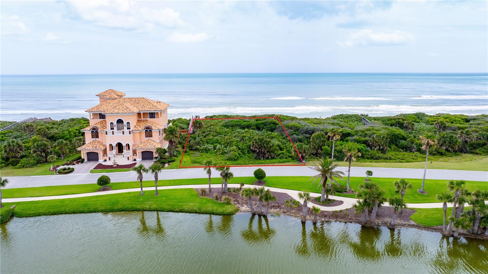 100' DIRECT, PRIVATE OCEANFRONT - one of the few unbuilt oceanfront homesites in the exclusive Playa del Sur neighborhood of Hammock Dunes Club.

Unobstructed ocean & beach access and views to east via 100 foot wide ocean frontage plus picture perfect westward views of Lake San Gabriel across palm-lined walking paths, all surrounded by palatial, Mediterranean style mansions. Although few unbuilt lots remain, there's no timeframe to build. Hammock Dunes is a meticulously landscaped, nationally recognized golf, tennis, sports, & restaurant community with gated access & 24/7 on site security.

73 Calle Del Sur is a deep building lot (>0.39 ac) with 20' setbacks from the front and sides and 25' setback in the rear for building envelope, optimally located in the middle of the prestigious, peaceful Playa del Sur neighborhood & far from the Rte. A1A road noise and headlights. Typical plan (3,500 sq-ft min up to 10,000 on this large lot) places a huge garage on entire ground level with elevator lobby, optional pool on level 2 plus house floors on levels 2-4 having 180 degree wide ocean/sunrise views over dune plus westward lake/sunset views from opposite (street) side of house. Seller already has survey with elevations to assist with planning.

Build your oceanfront dream home with a high, palm-filled dune for protection from ocean waves, solid, dry ground for building, wide, pristine beach with rare orange-tinged, cochina sand and Atlantic vistas as far as the eye can see, plus private beach walkover, manicured streets and landscaping, underground utilities already in place, & gated access with 24/7 on site security - all community-maintained, including dunes and walkovers (Each is sited between every two homes and shared with one neighbor via gated access, so that one's ocean and beach view is unobstructed despite full, immediate beach access over the dune.). With fantastic year-round weather Palm Coast is situated between St. Augustine & Jacksonville to the North and Daytona Beach & Cape Canaveral to the South with just 60 minutes to major airports. (Whales, dolphins, and turtles appear ad lib at no community expense!)

Membership in the private Hammock Dunes Club is available but not required along with an option for all amenities sans golf at a much reduced price. Its two Audubon-certified golf courses (Tom Fazio, Rees Jones) helped it earn "Distinguished Emerald Club of the World" & "Platinum Club of America" status. Many residents also enjoy the unlimited options for private and social interactions in the Club's panoramic oceanfront clubhouse and heated pool, where two of the Club's restaurants (one formal, one casual) look out upon the beachfront 18th hole and professional-level croquet courts situated in landscaped walks and breezy seating areas with Atlantic waves in the background, plus there's a 5,000 sq ft fitness center with ocean views, laundry, social rooms, & pro-shop, all provided with friendly, professional, long term staff. Club membership also provides access to an additional restaurant, pro-level tennis courts, bocce, and pickleball courts at verdant locations along the golf courses and extensive, natural property.

Imagine watching from your own home as the sun rises over the Atlantic through palms, walking several feet for sand and waves, and then later from westward rooms watching the sunset over palms and a lake... It is a rare place which looks as good in person as in photos, or even better...
