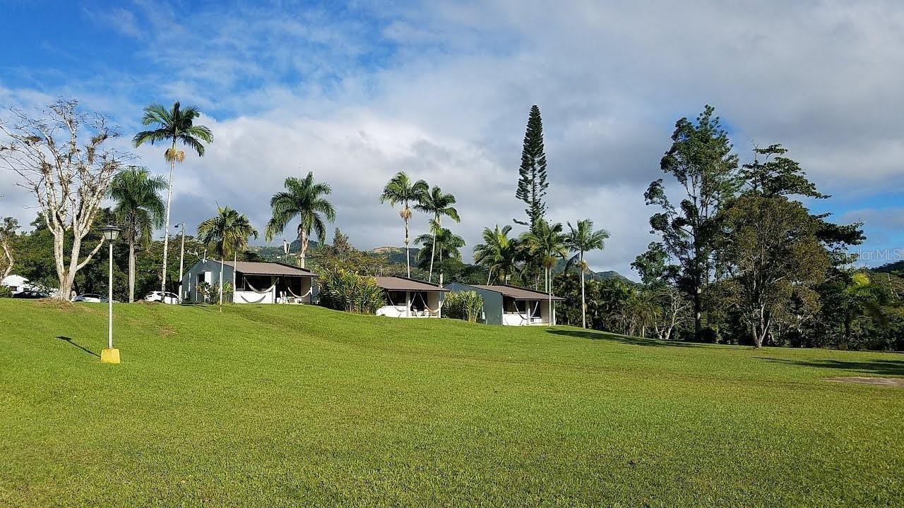Embrace Tranquility and Opportunity at Parador Villas Sotomayor, Adjuntas

Discover the allure of Villa Sotomayor Lodge, a celebrated eco-retreat nestled in the heart of Puerto Rico's majestic mountains in Adjuntas. This unique property spans 13 lush acres, offering a blend of serenity, culture, and nature.

Features at a Glance:

Accommodations: 35 enchanting cabins provide a cozy, intimate getaway amidst natural splendor.
Fitness: Gym ensures guests maintain wellness routines in a motivating environment.
Dining: Two distinguished restaurants boast 20 years of exceptional service.
Recreation: A vast, picturesque pool area invites relaxation and leisure, set against the stunning mountainous landscape.
Equestrian Facilities: Equestrian enthusiasts will revel in the extensive land, complete with horse stables.

Adjuntas, a treasure in the mountains, is renowned for its peaceful ambiance, cultural richness, and the iconic "Sleeping Giant" view. Villa Sotomayor Lodge isn't just a property; it's a lifestyle—a sanctuary for those seeking a tranquil retreat or the excitement of eco-tourism adventures.

For the visionary buyer or investor: This is more than a purchase; it’s an invitation to continue a legacy of hospitality and a promise of a lifestyle in harmony with nature.

Begin your adventure in Puerto Rico with this unparalleled property offering. A haven for relaxation and a prime opportunity for business awaits.