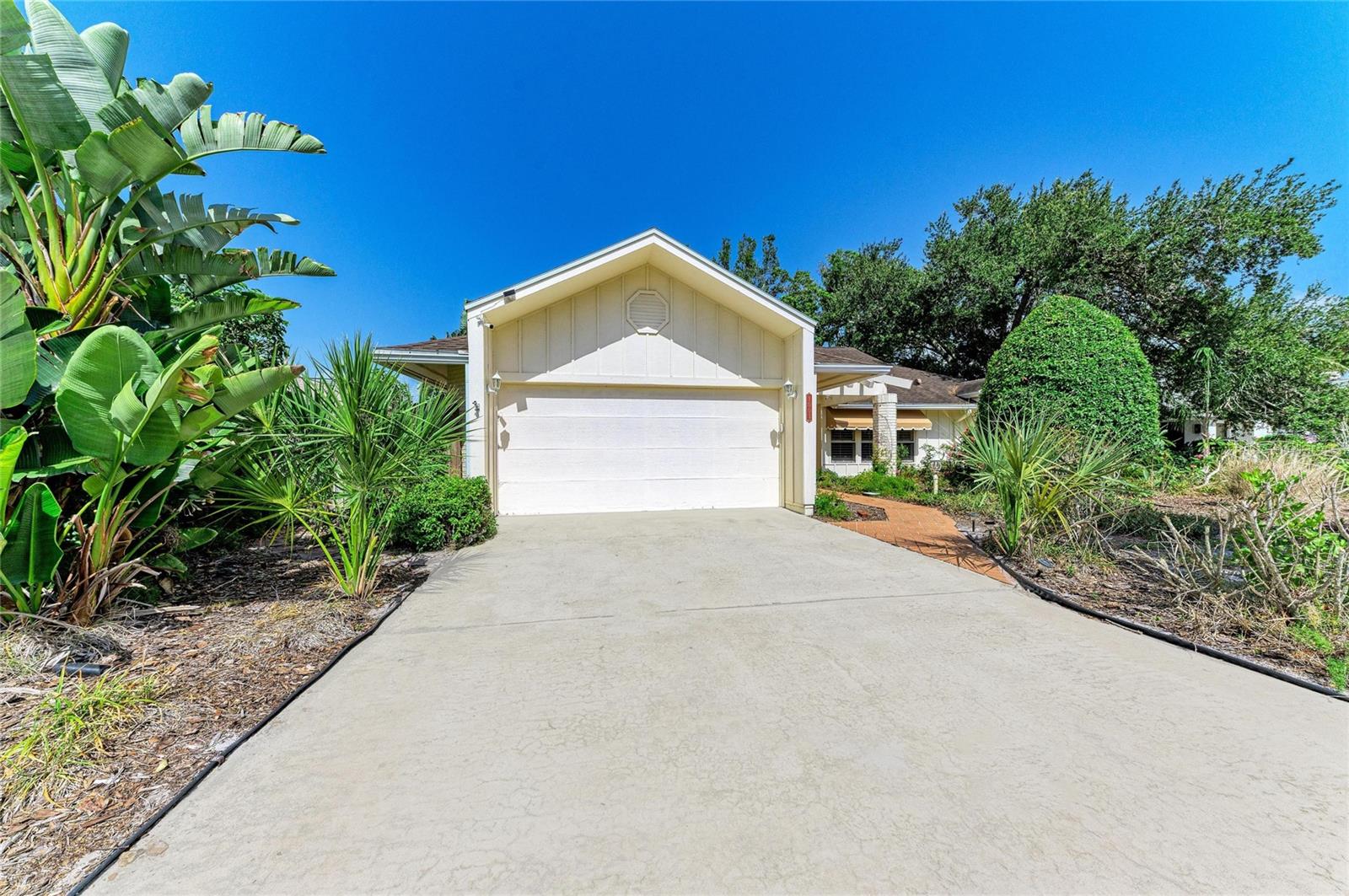 Turnkey Tropical Retreat with Proven Rental Income!
Welcome to this beautifully maintained, fully furnished 2-bedroom, 2-bath home in the highly desirable West Palma Sola area of Northwest Bradenton. Successfully operating as an Airbnb for the past four years, this property offers a proven rental history while providing the flexibility to enjoy as a primary residence, vacation home, or income-producing investment.
Nestled on a peaceful pond with lush tropical landscaping, this home features soaring vaulted ceilings with exposed wood beams, an open great room, a cozy wood-burning fireplace, plantation shutters, and a spacious kitchen with granite countertops and newer stainless steel appliances. The primary suite overlooks the tranquil pond, while the screened lanai is the perfect place to relax and enjoy the Florida lifestyle.
The oversized lot offers room to add a custom pool. Ideally located just minutes from Robinson Preserve, Palma Sola Bay, Anna Maria Island beaches, shopping, dining, parks, and top-rated schools.
Move right in or continue the successful vacation rental business. This turnkey property is ready to enjoy from day one. Rental history available upon request.