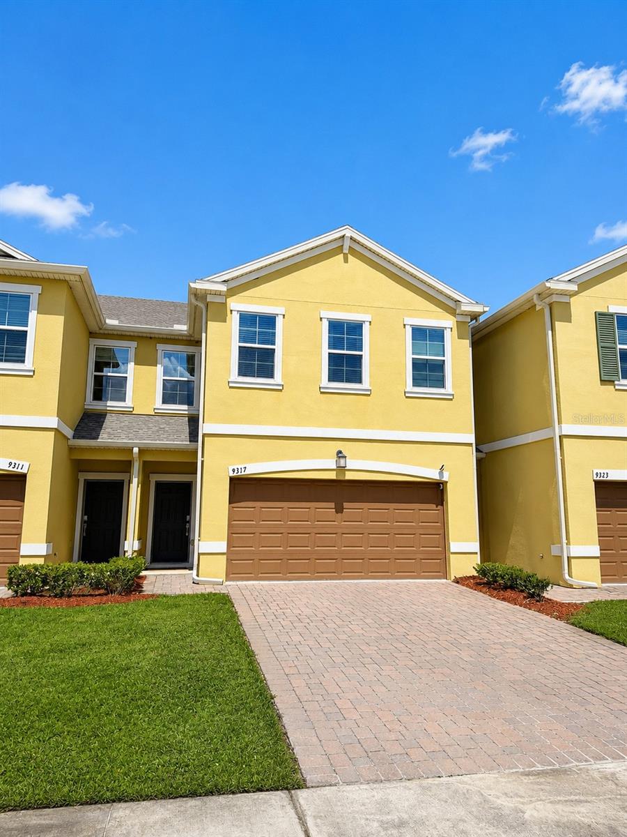 Virtually Staged. Welcome to 9317 Tecumseh Drive — a beautifully maintained 2020-built townhome offering the perfect blend of modern design, everyday comfort, and an unbeatable East Orlando location. Nestled in the desirable Econ Trails community, this 3-bedroom, 2.5-bath residence delivers a stylish lifestyle with thoughtfully designed spaces and low-maintenance living.

Step inside and discover an inviting open-concept floor plan filled with natural light, creating a warm and welcoming atmosphere throughout the main living areas. The spacious living and dining spaces flow seamlessly into the modern kitchen, featuring sleek cabinetry, quality finishes, and a functional layout that makes cooking, entertaining, and everyday gatherings effortless.

Upstairs, you’ll find three generously sized bedrooms designed for comfort and privacy. The primary suite offers a peaceful retreat with a private en-suite bathroom and ample closet space, while the additional bedrooms provide flexibility for family, guests, a home office, or personal hobbies.

A two-car garage adds convenience and extra storage, while the newer construction offers the benefits of modern features, energy efficiency, and reduced maintenance. Enjoy the ease of townhome living while still having the space and privacy you desire. HOA covers exterior maintenance and lawn care, while community amenities include a resort-style pool, playground, and security.

Beyond your doorstep, Econ Trails offers an array of community amenities, and the home’s prime location places you minutes from Waterford Lakes Town Center, University of Central Florida (UCF), Valencia College, Blanchard Park, shopping, dining, and major roadways including FL-408 and FL-417.

A rare opportunity to own a modern townhome in the heart of East Orlando awaits. With its thoughtful design, spacious layout, and unbeatable access to everyday conveniences, 9317 Tecumseh Drive delivers the perfect balance of comfort, style, and location. Come experience everything this exceptional home has to offer—schedule your private showing today.