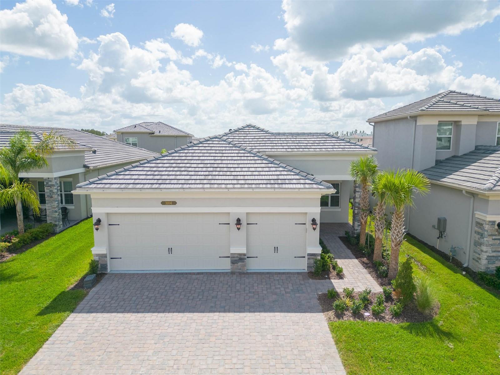 Price improved!!! Welcome to this brand new 4 bedrooms 3 bathroom spacious home nestled in Wesley Chapel's SOLD OUT community of Winding Ridge! The Laurel floor plan by GL homes offers endless possibilities for customization and versatility. The many features of this home include, 3 car garage (2 doors) with a side door to provide access to the yard, lanai area, glass entry door, prelim for laundry sink, tile throughout the entire home (no carpet), tiled shower walls in each shower, shower enclosure, stone countertops, and tankless water heater. Outside, the charm continues with a beautiful pond view, creating a serene backdrop for outdoor gatherings or simply enjoying the peaceful surroundings. You DO have room for a pool! This fenced in back yard offers an extended covered patio and the pre-plumbing of hot & cold water lines, drain line, and gas line. Dedicated drop off of an interior wall for a future pool heater. 6" seamless Gutters on the front of the house, keyless garage door, speaker prewire, security system prewire, as well as electrical surge protection are other upgrades included.
Winding Ridge is an exclusive, gated luxury neighborhood with no CDD fees! This home offers convenient interstate access, resort style amenities, highly sought after Wesley Chapel schools, making it the perfect place to call home. Amenities include indoor and outdoor basketball courts, pickle ball and tennis courts, youth mini waterpark, resort-style community pool, indoor gym and clubhouse. With its modern features, thoughtful design, and stunning pond view, this one-year-old home is truly a gem waiting to be discovered. Don't miss out on the opportunity to make this your dream home! Call today to schedule your private showing!