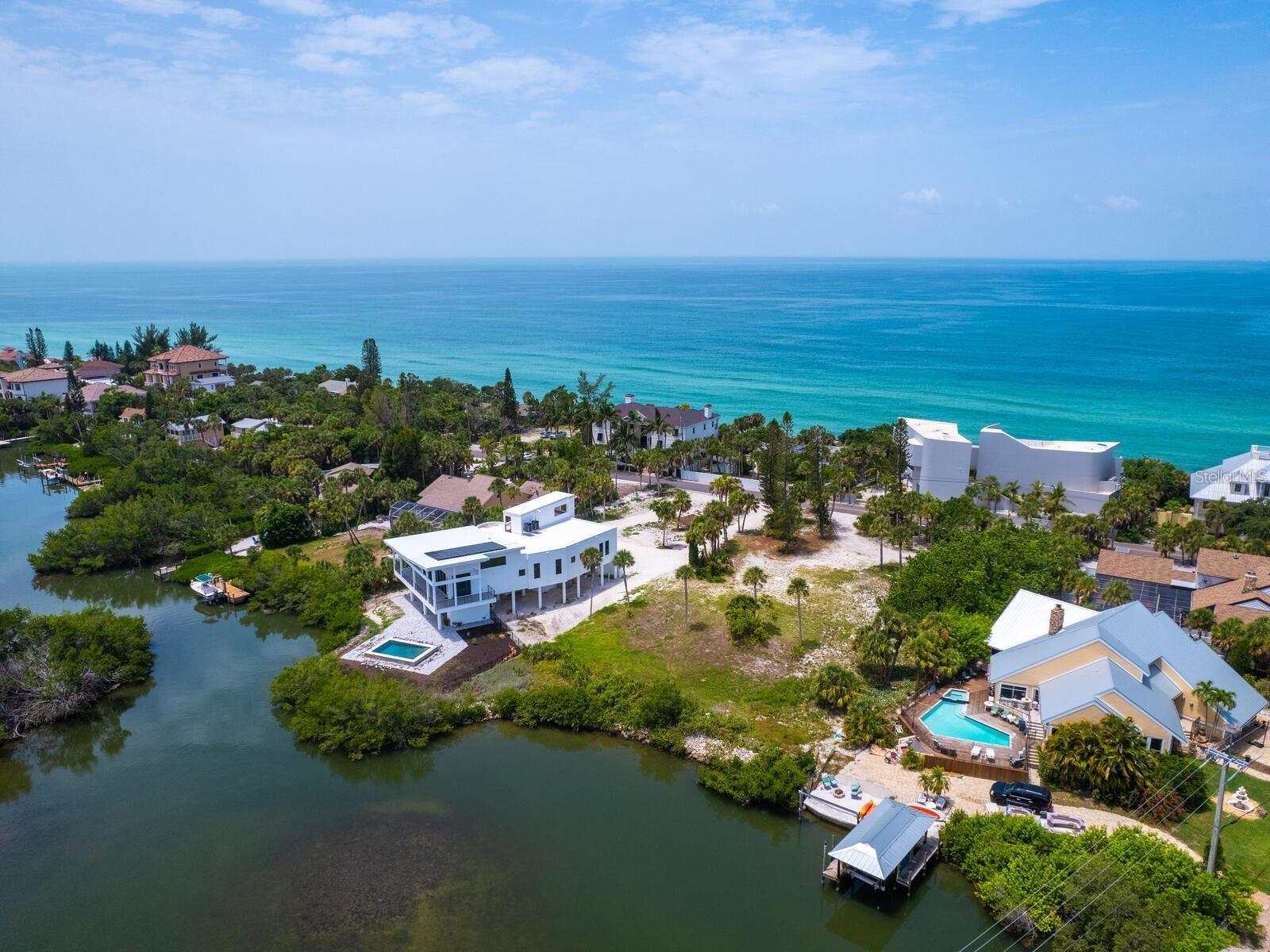 One of the last remaining vacant bayfront parcels on exclusive Casey Key. This nearly one-acre property offers approximately 130 feet of serene bay frontage, an ideal canvas to build your dream home. Positioned near the north Blackburn Point Bridge, you'll enjoy quick, convenient access on and off the key.  Bring your architect, builder, and designer—or choose from a carefully curated list of trusted professionals ready to bring your vision to life. Imagine adding a dock and lift for kayaking, paddleboarding or boating to the area's many waterfront restaurants. Just five minutes to Publix, restaurants, golf and tennis. Downtown Venice is only 10 minutes south, and Sarasota’s vibrant arts, dining, and cultural scene is just 15–30 minutes north. With unmatched amenities and a laid-back island lifestyle, this is a rare opportunity to create something special. Those fortunate enough to live on Casey Key know, there’s nothing else quite like it.