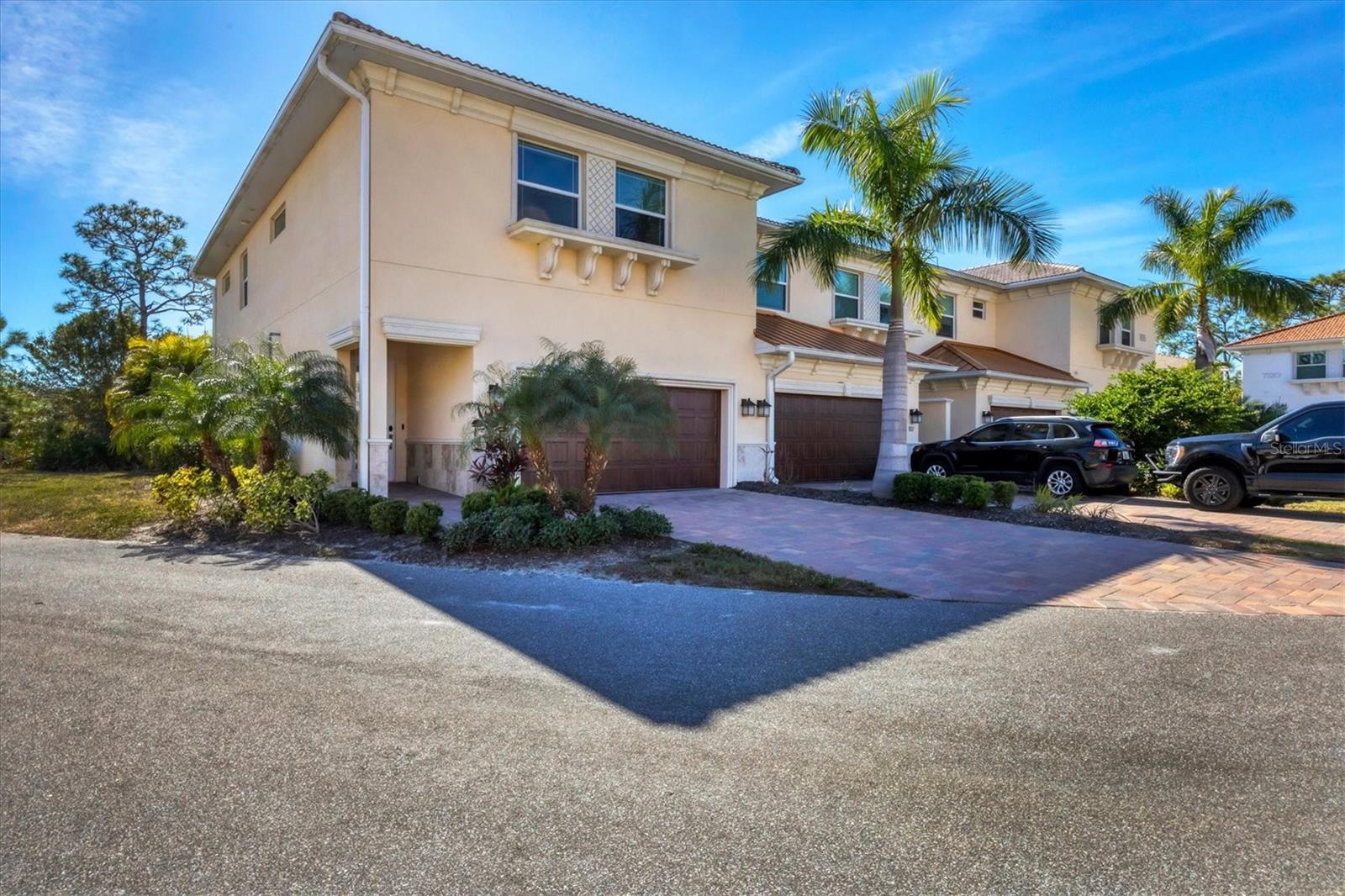 A standout opportunity for effortless, lock-and-leave living in the heart of Lakewood Ranch. This move-in-ready corner-unit townhouse in Hidden Creek offers 2,440 square feet of bright, refined living, enhanced by additional windows that flood the home with natural light—creating an airy, inviting feel throughout.

Thoughtfully designed for both comfort and functionality, the two-story layout features 3 bedrooms, 2.5 baths, and a versatile den—perfect for a home office, media room, or guest retreat. A private in-home elevator sets this residence apart, delivering seamless access to both levels and long-term ease of living.

The main level impresses with soaring 10-foot ceilings and an open-concept great room that flows effortlessly into the dining area and gourmet kitchen. Designed to elevate everyday living, the kitchen showcases quartz countertops, upgraded stainless steel Bosch appliances, dual sinks, and abundant soft-close cabinetry—ideal for entertaining or effortless daily use.

Upstairs, spacious bedrooms provide privacy and flexibility, while the primary suite offers a true retreat, complete with generous closet space and a spa-like bath featuring a Greek-style shower with marble flooring.

Additional highlights include a two-car garage, covered entry, and maintenance-free exterior, making this an exceptional choice for full-time residents, seasonal homeowners, or investors.

Residents of Hidden Creek enjoy resort-style amenities, including a heated pool, spa, firepit lounge, and outdoor grilling areas. Ideally located just minutes from University Town Center, Waterside Place, and Lakewood Ranch Main Street, with convenient access to dining, shopping, golf, and Sarasota’s world-renowned beaches.

Turnkey, low-maintenance, and perfectly positioned—this is the corner-unit opportunity buyers have been waiting for.