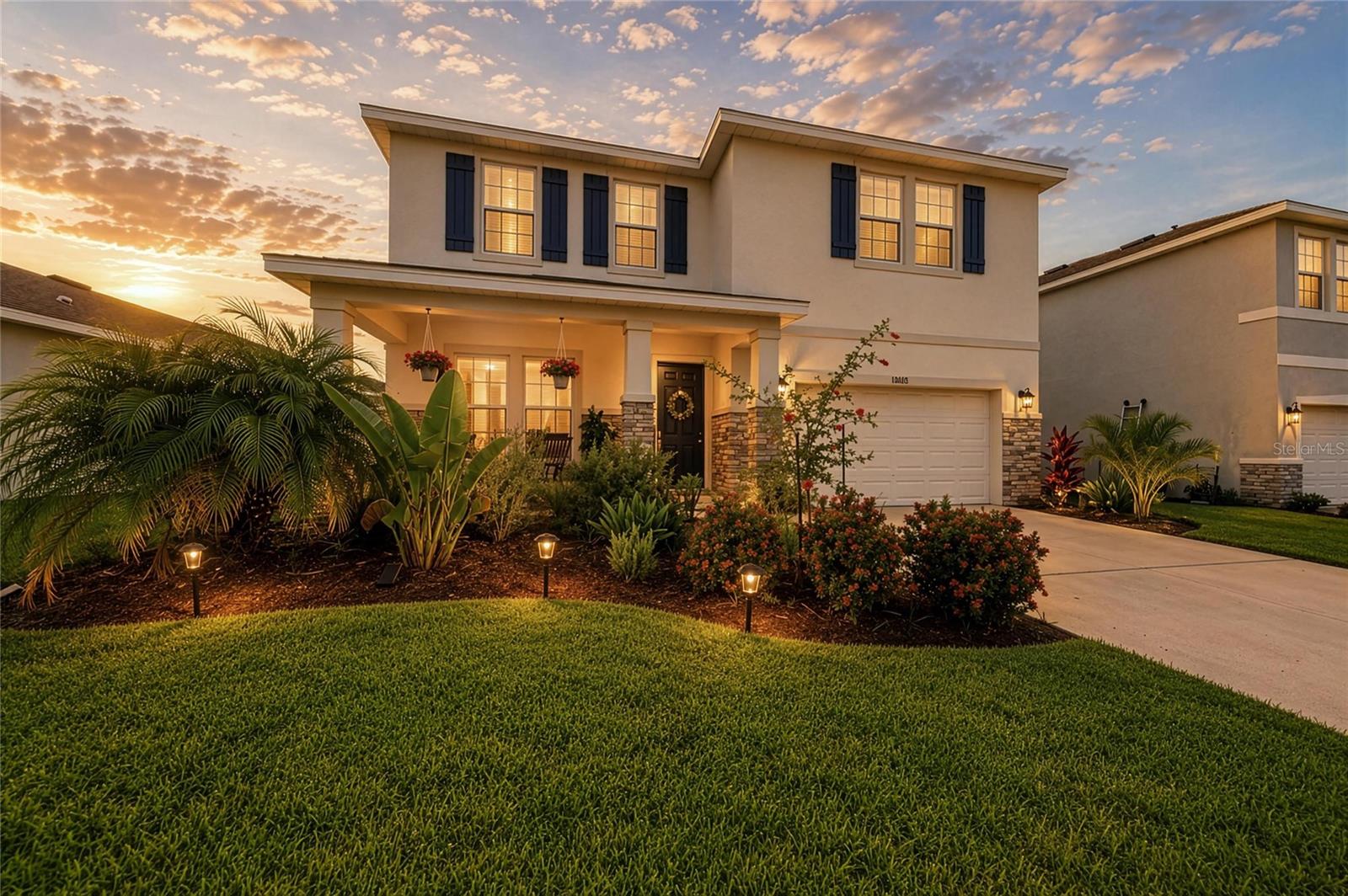This home looks like a MODEL!  If you've been looking for a large home 4Bd/3Ba and an additional BONUS ROOM and DEN with designer finishes and custom built-ins, a fenced yard , beautiful sunset views then you've found it.. Upgraded by its owner-a professional Interior Designer- this home has so many great designer features.  The Den has paneled farm doors, and a custom built-in wall with shelves and cabinetry.  The Great room offers matching built-ins with floating shelves framing a beautiful remote controlled fireplace.  All floors downstairs are tile in the living areas and baths. The kitchen has granite counters, stainless appliances, taller white cabinets, and tiled backsplash.  There is an added butlers pantry with cabinets and granite that match the kitchens, across from the large walk-in pantry.  All bedrooms are spacious and the master has an added sitting area great for relaxing with your favorite novel. All baths have tiled floors and the master bath has double vanities a walk-in shower and bathtub. All baths and the kitchen have granite counter tops.  The Bonus room is very big and a great area for a pool table or tv room.  There is upgraded lighting and fans throughout this home. The owners built a mud room for dropping book bags coming in from the garage.  Beautiful sunset views can be seen nightly from your solid panel screened back porch area .  There is also an additional back patio area great for grilling out.  This home comes with smart home features that can allow you to lock and unlock doors remotely, turn on and off lights, control your AC system and there are 2 ring cameras front and back. Not only is this home gorgeous but the community has it all too with 2 huge pools, a fully equipped gym, a dog park, a clubhouse, and a playground area.  And this community has low fees.  There are many new restaurants nearby and interstate 75 is very close. Some of the very best beaches in the world are only about 20 miles away. This home has it all.  If you are looking for a model home without the high price tag , you'll love this one.  Come see why you will want to make this your forever home.