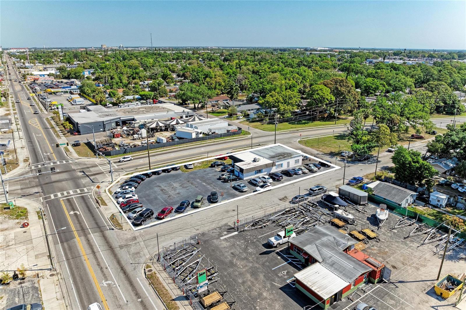Position your business for success at this high visibility corner location with incredible exposure.  Currently leased through 9/27. 
Private offices, 2 baths, auto detail area.
Currently leased to auto dealership.
HVAC changeout 2021. This versatile commercial property is ready for its next owner's vision. Schedule a showing today.