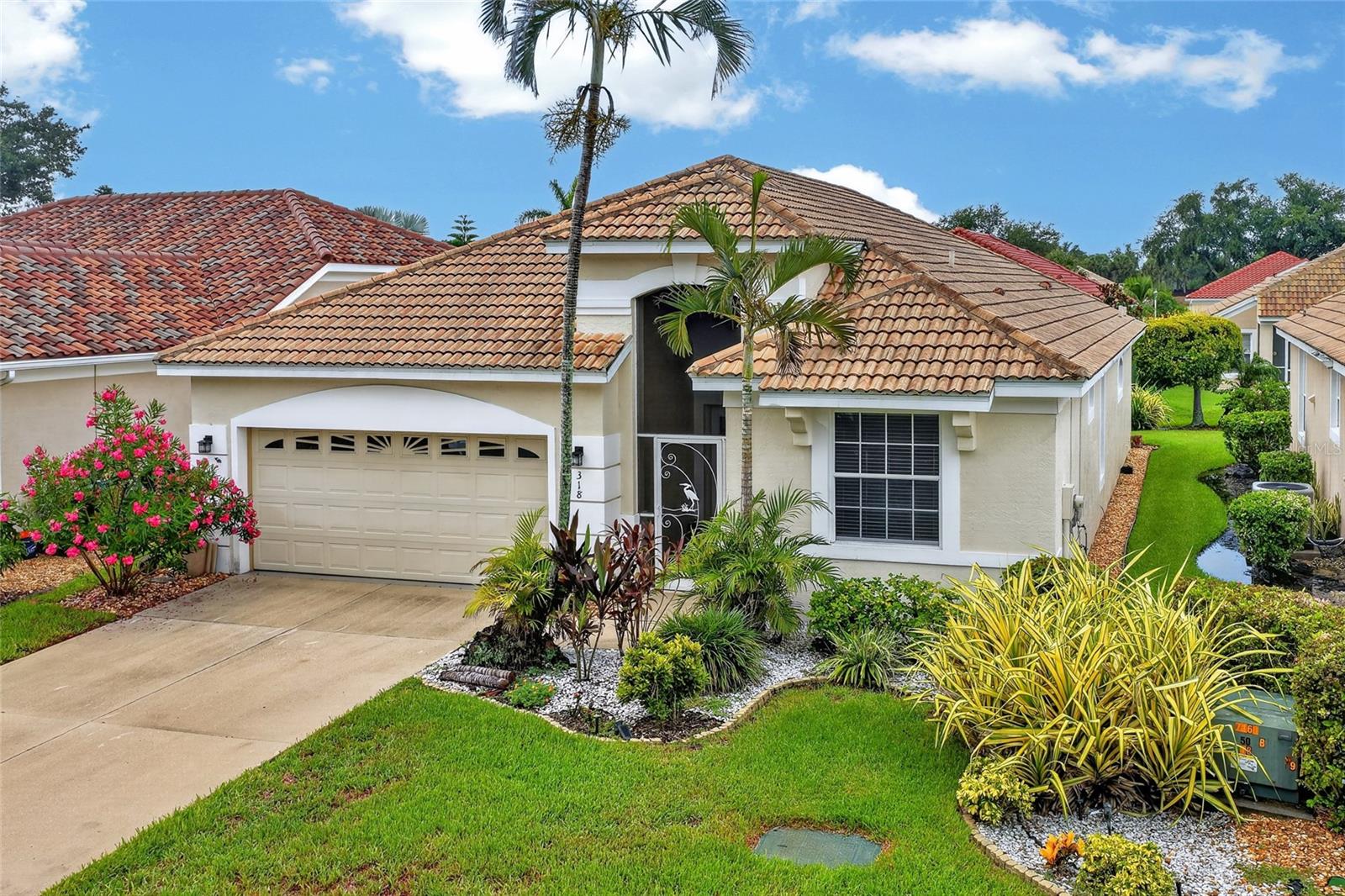 WELCOME TO EASY FLORIDA LIVING IN WEXFORD ON THE GREEN! Nestled within one of Venice’s most desirable communities, this beautifully maintained 2 BEDROOM + DEN, 2 BATHROOM, 2 CAR GARAGE HOME offers the perfect combination of comfort, style, and low-maintenance living. Located in the sought-after Wexford on the Green community, residents enjoy a peaceful setting along with access to a community pool and a convenient location close to shopping, dining, golf, and Gulf Coast beaches.

Step inside and discover a thoughtfully designed floor plan that flows seamlessly from room to room. Tall ceilings and abundant natural light create an open and airy atmosphere, while luxury vinyl plank flooring throughout the main living areas and tile in high-traffic spaces provide both beauty and durability.

At the heart of the home, the spacious kitchen is designed to accommodate both everyday living and entertaining. Featuring granite countertops, ample cabinetry, generous counter space, and a functional layout, this kitchen offers plenty of room for meal preparation, storage, and gathering with family and friends.

The versatile den provides endless possibilities and can easily serve as a home office, hobby room, reading retreat, or additional guest space. The guest bathroom has been beautifully remodeled, adding a fresh, modern touch to the home.

The spacious primary suite provides a relaxing retreat featuring a large walk in closet and is complemented by an updated ensuite bathroom with a soaking tub and separate shower.

One of the home’s standout features is the incredible outdoor living space. Expansive sliding glass doors open to an oversized screened lanai, creating a seamless transition between indoor and outdoor living. Whether you’re enjoying your morning coffee, entertaining guests, or simply relaxing and taking in the Florida weather, this outdoor space is truly an outdoor lover’s paradise.

With its desirable floor plan, updated bathrooms, spacious kitchen, beautiful flooring, and exceptional lanai, this home offers everything needed to enjoy the Florida lifestyle. Conveniently located near downtown Venice, area beaches, golf courses, medical facilities, and everyday amenities, you’ll be perfectly positioned to enjoy all that Southwest Florida has to offer.

Don’t miss your opportunity to own this beautifully maintained home in the highly sought-after Wexford on the Green community!