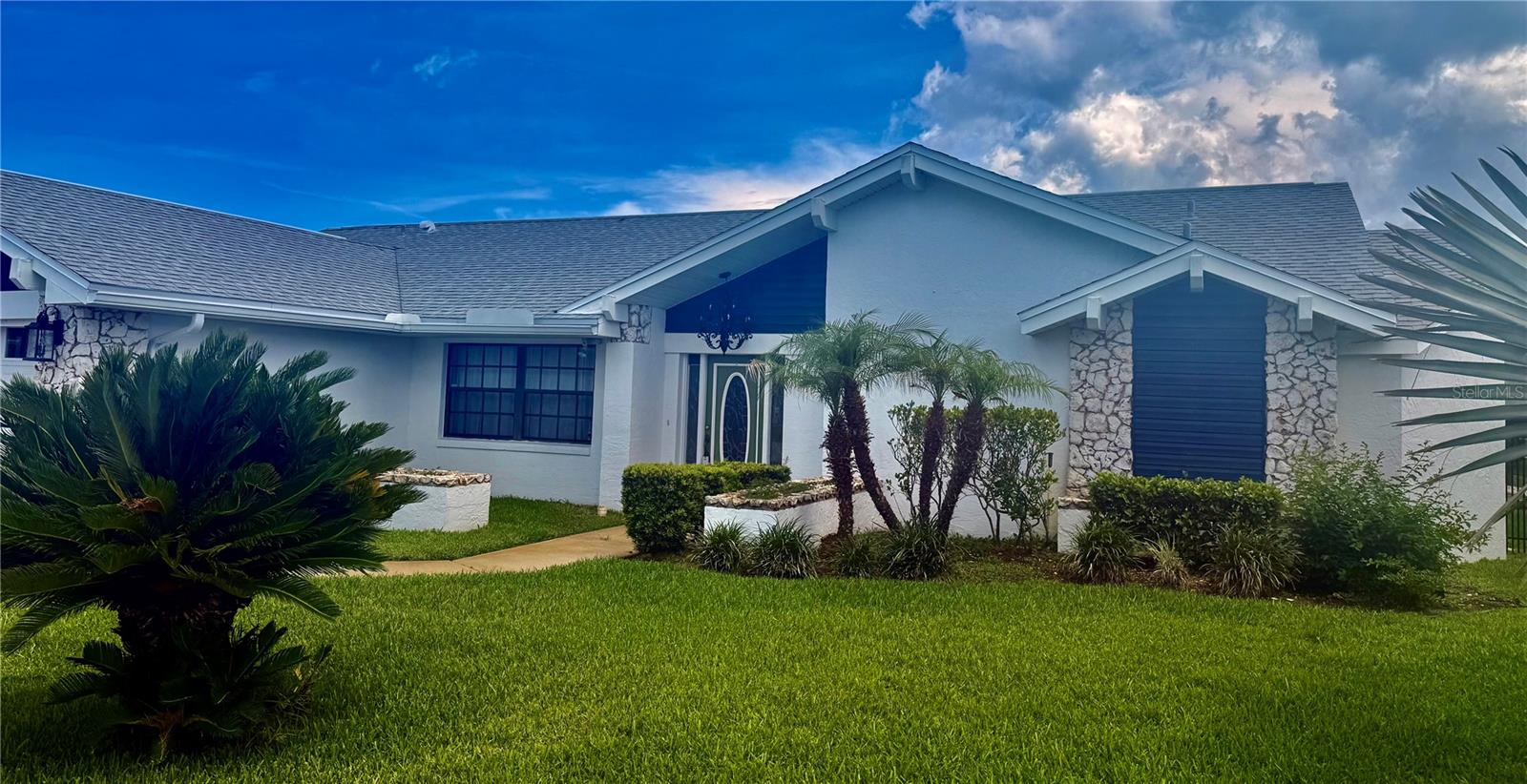 Virtually Staged. Waterfront Living at Its Finest! Welcome to this beautifully updated canal-front home offering the perfect blend of luxury, comfort, and Florida lifestyle. Situated on a desirable waterfront homesite, this stunning residence features 8 spacious rooms, 2 bathrooms, and breathtaking water views from nearly every angle.
The heart of the home is the newly remodeled chef's kitchen, complete with gorgeous leathered granite countertops, a large center island, wine refrigerator, double ovens, abundant cabinetry, and premium finishes designed for both everyday living and effortless entertaining.
Elegant travertine flooring flows throughout the home, while the inviting fireplace creates a warm and welcoming atmosphere. The spacious primary suite serves as a private retreat, featuring serene water views and a luxurious soaking tub perfect for relaxation.
Step outside to your own waterfront paradise. The entire rear of the home overlooks the canal, creating a spectacular backdrop for daily living. Enjoy the heated pool year-round, unwind beneath the expansive covered lanai, or entertain family and friends while taking in the peaceful water views. Boating enthusiasts will appreciate the private boat dock, providing direct access to the water right from your backyard.
Whether you're hosting large gatherings, enjoying sunset cocktails by the pool, or heading out for a day on the water, this exceptional property offers the ultimate Florida waterfront lifestyle. A rare opportunity to own a move-in-ready canal home with premium upgrades, stunning views, and endless possibilities for entertaining.