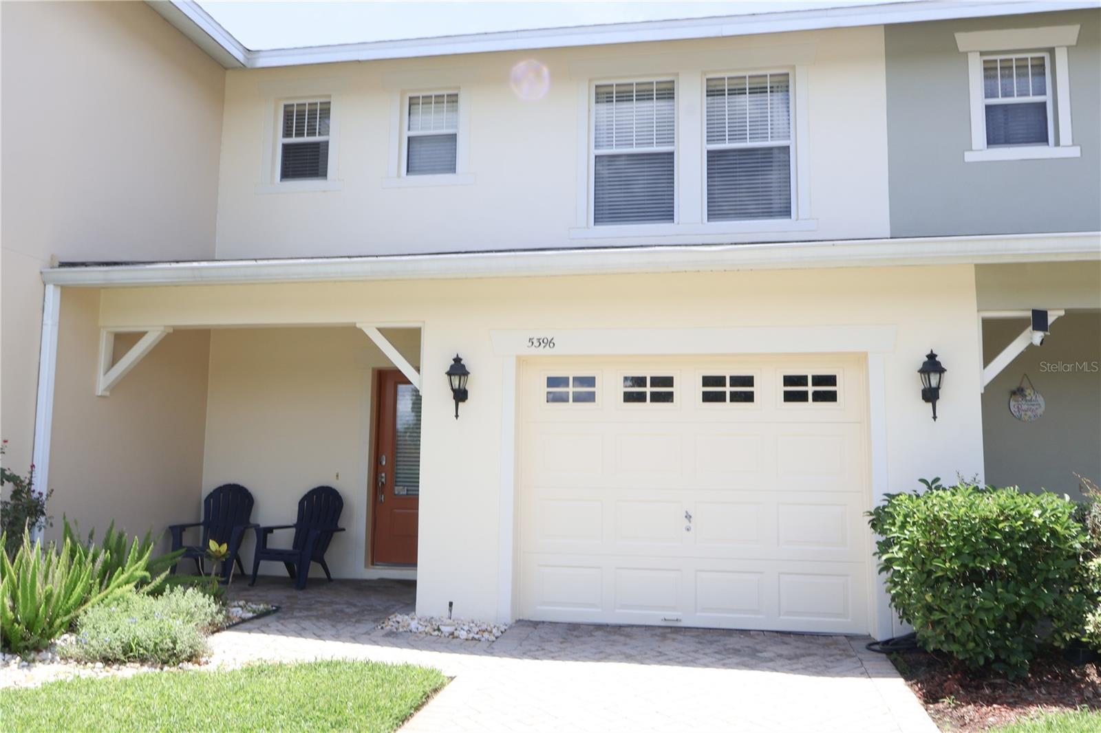 Welcome to this beautifully maintained 3-bedroom, 2.5-bath home in the gated community of Tivoli Village. This inviting residence features a spacious and functional floor plan with upgraded flooring throughout the main living areas. The kitchen offers stainless steel appliances and a center island with seating, making it ideal for casual dining and gathering. The primary suite boasts an upgraded walk-in shower, while a dedicated laundry and attached garage add convenience. Enjoy tranquil pond views from the front and back, and the open living areas filled with natural light, while the screened lanai and outdoor space offer the perfect place to relax and take in the scenic surroundings. Conveniently located near Orlando International Airport, Lake Nona Medical City, SR 417, SR 528, shopping, dining, and area attractions. This exceptional home combines comfort, convenience, and picturesque water views. Schedule your private showing today!