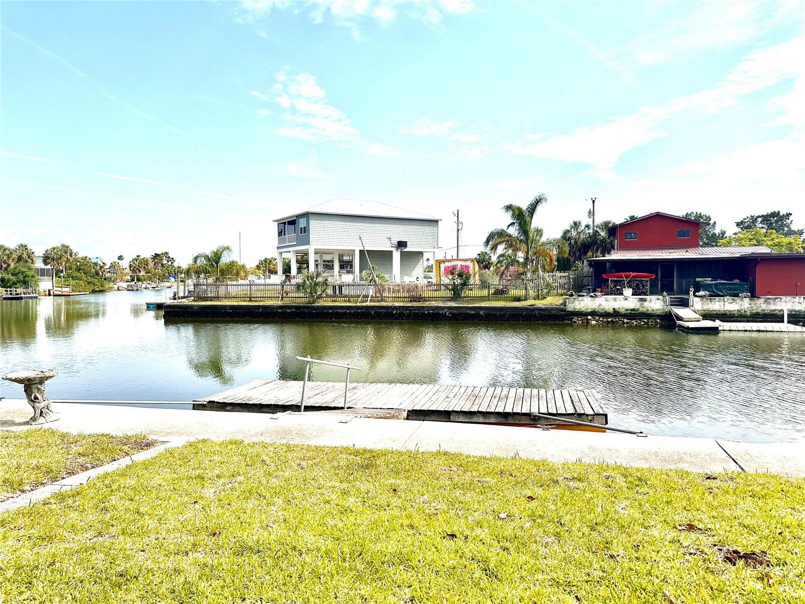 Completely Remodeled Gulf Access Retreat in Hernando Beach!
Discover true Old Florida paradise in this beautifully remodeled 3-bedroom, 1-bath home and a bright Florida room—perfect for relaxing or entertaining with a view! Every inch of this home has been thoughtfully updated for modern coastal living, with luxurious waterproof vinyl plank flooring, waterproof Endura wall panels, and custom waterproof kitchen and bathroom cabinetry designed to withstand the Florida lifestyle.  4 Head mini split AC and heat with wall unit ac's in two of the bedrooms. Hurricane impact front and back doors.  Roof was replaced in 2017.  Furnishings are negotiable.
Located on a direct Gulf-access canal, this home offers deep water with plenty of room for your sailboat and endless opportunities for boating, fishing, and waterfront adventures. Enjoy convenient access to local waterfront restaurants and the laid-back charm of Hernando Beach—where every day feels like a vacation.
Additional highlights include a large garage, a detached shed for extra storage, and ample parking for your boats, RV, or other toys. Whether you’re seeking a full-time waterfront residence, a vacation getaway, or an investment property, this home is ready for you to move right in and start living the Gulf Coast dream!