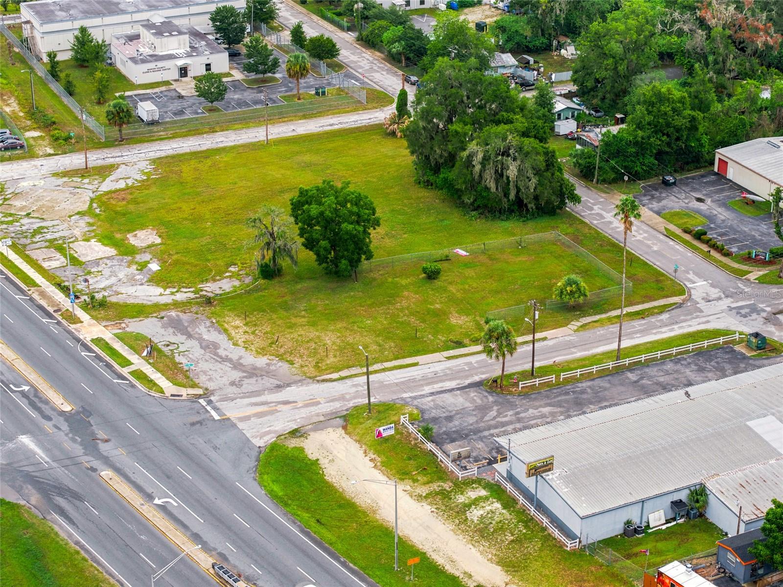 Unlock prime visibility and flexible development potential with this B-4 zoned commercial land. Consisting of two adjacent lots totaling approximately 0.38 acres, this cleared, in-town site sits just off N Pine Ave/US 441 in the gateway to Downtown Ocala, placing your business minutes from major corridors, dense residential neighborhoods, and established retail.