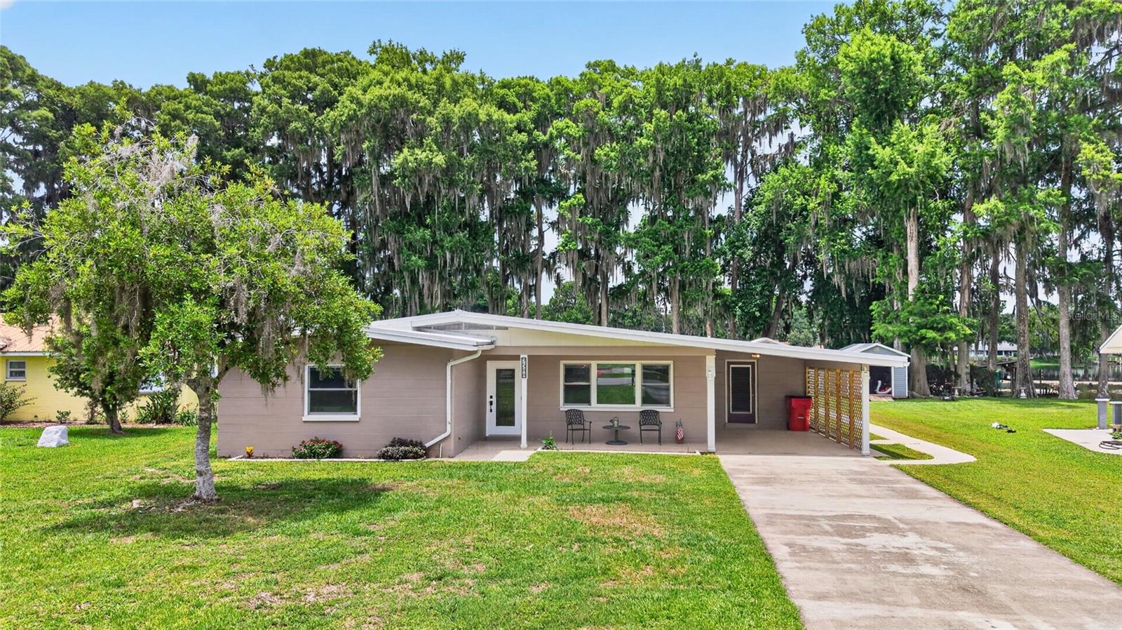 Welcome to 7588 S Crescent Loop in Floral City, Florida, where peaceful waterfront living and Old Florida charm come together. This property offers the opportunity to enjoy beautiful water views and direct access to the water, creating the perfect setting for those who appreciate nature, recreation, and a slower pace of life. Whether you're enjoying your morning coffee overlooking the water or spending the afternoon exploring nearby waterways, this property is designed to embrace the Florida lifestyle. Floral City is one of Citrus County's hidden gems, known for its historic oak-lined roads, small-town atmosphere, and abundant outdoor recreation. Water enthusiasts will appreciate the area's access to boating, kayaking, fishing, and wildlife viewing, while nature lovers can enjoy the scenic beauty that surrounds the community year-round. The nearby Withlacoochee State Trail offers miles of paved trails for biking, walking, and running, while local lakes, rivers, and parks provide endless opportunities for outdoor adventure. Despite its tranquil setting, Floral City remains conveniently located near Inverness, Brooksville, and other nearby communities for shopping, dining, medical facilities, and everyday conveniences. Whether you're searching for a primary residence, seasonal getaway, or waterfront retreat, this property offers the rare combination of water views, water access, natural beauty, and small-town Florida charm. Experience the lifestyle that makes Floral City one of the Nature Coast's most treasured destinations. Schedule your private showing today!!!!