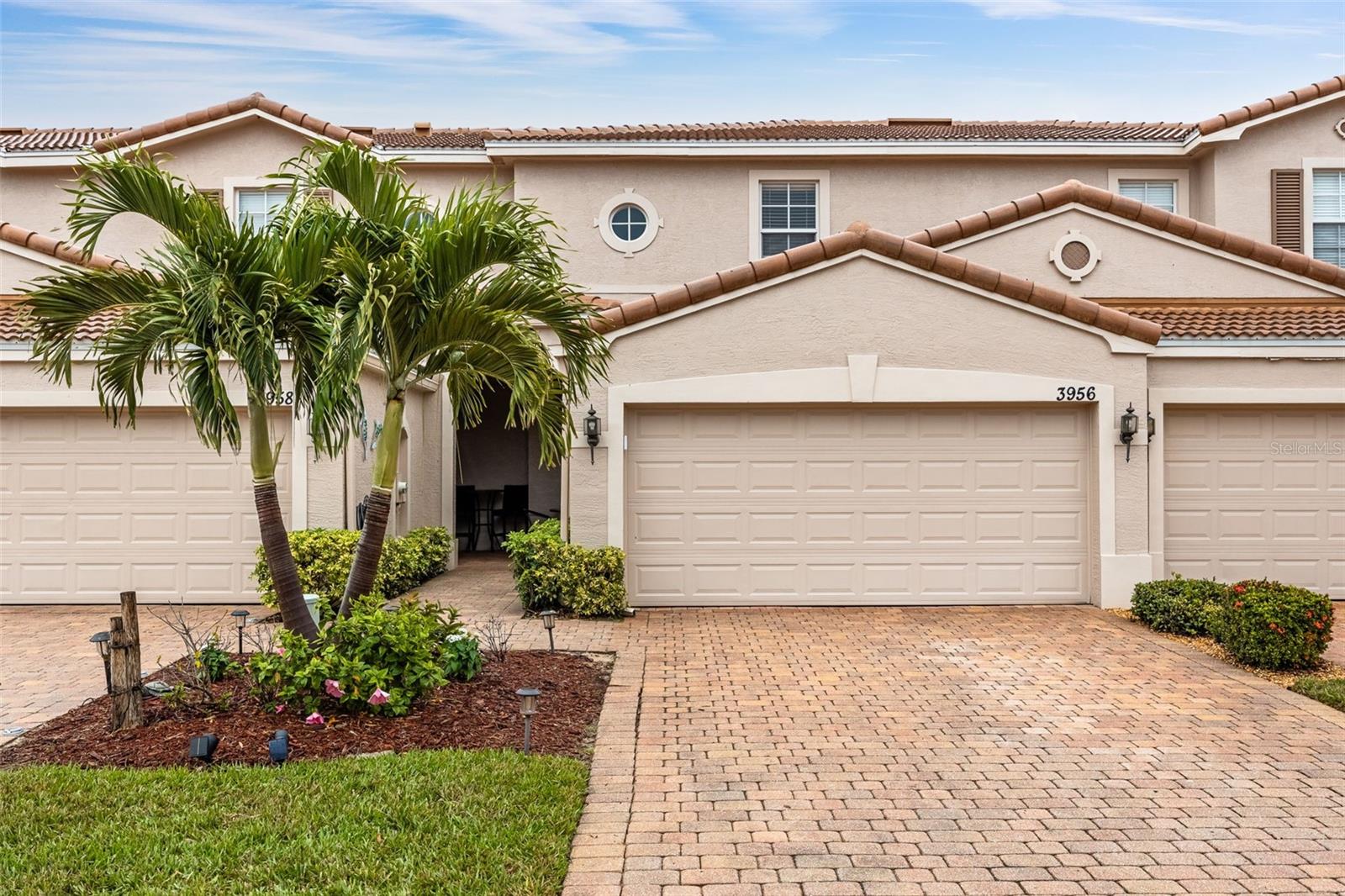 Check out this townhome where comfort and convenience come together! Located in a gated Fort Myers community. Bright and open downstairs with a large eat in kitchen that has a pantry and entrance from the garage. The living and dining room are open and have a slider door the private screened lanai. A convenient half bathroom downstairs plus a storage closet make it complete. Upstairs has the main bedroom with high tray ceiling , a walk-in closet and bathroom with separate soaking tub, shower and 2 sink vanities. The guest bedroom also has a walk in closet and private bathroom. A practical laundry closet and some additional storage complete the upstairs. Fresh interior paint, brand-new carpet upstairs, new blinds, and updated smoke detectors make this home move-in ready. The San Simeon community residents enjoy a beautiful clubhouse, resort-style pool, fitness center, and a play area. This is low maintenance living with a welcoming neighborhood vibe. Don’t miss your chance to call it home!