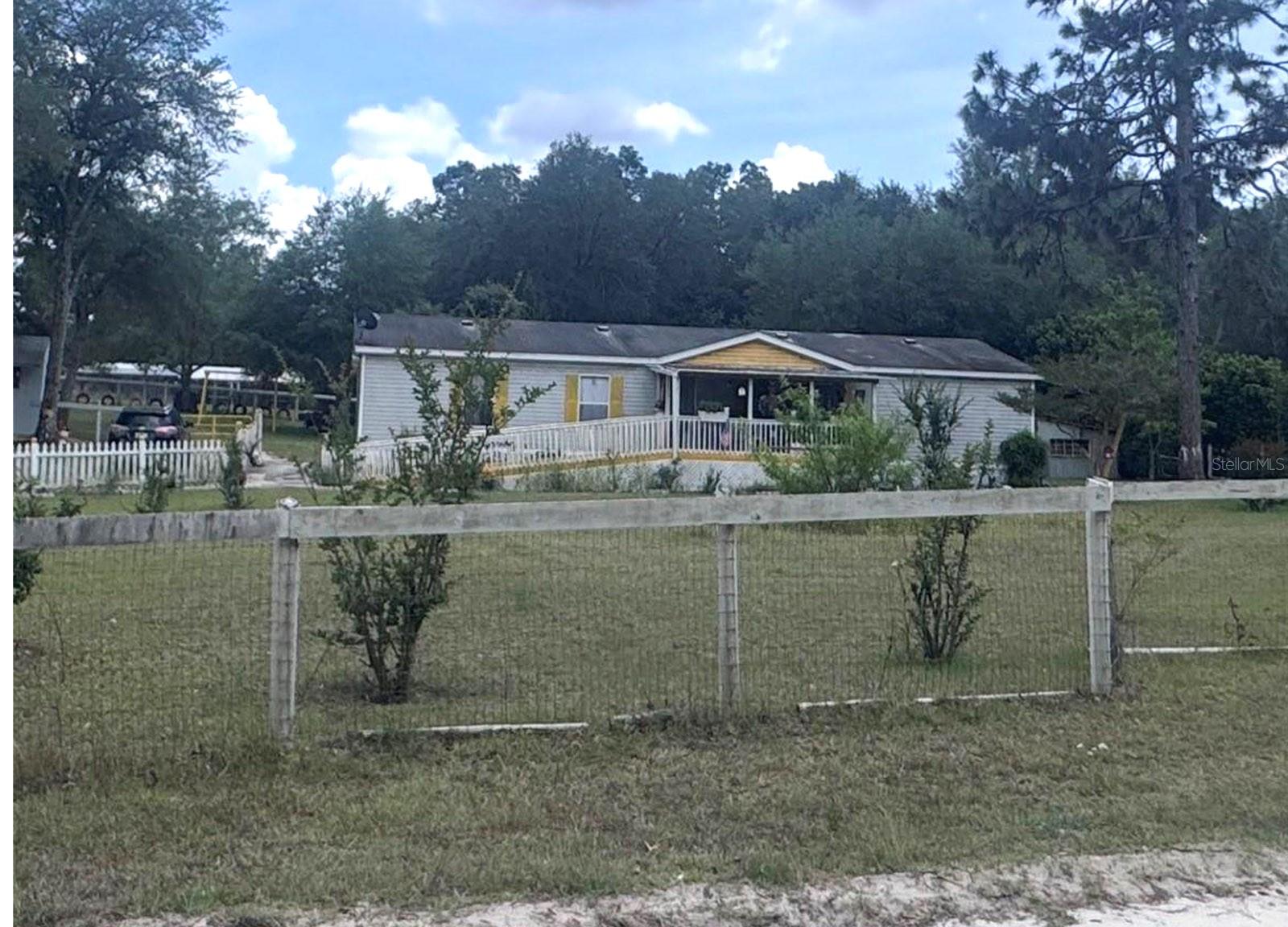 OCALA HIGHLANDS WEST 4 BEDROOM, 2 BATH HOME ON 1.25 ACRES! Spacious 4 bedroom, 2 bath manufactured home, situated on a generous 1.25 acre lot. This property offers the perfect blend of comfort and privacy with plenty of room to enjoy outdoor living. The home features a well-designed layout with ample living space, ideal for families or those who enjoy extra room to spread out. Located in an ARR zoning area, you’ll have flexibility and fewer restrictions, making it a great option for a variety of lifestyles. One of the standout features is that the property is not located in a flood zone, providing added peace of mind. In the backyard, you’ll find a convenient storage shed—perfect for tools, equipment, or additional storage needs. Whether you're looking for a primary residence or a property with land to grow into, this home offers excellent value and opportunity in a quiet, rural setting.