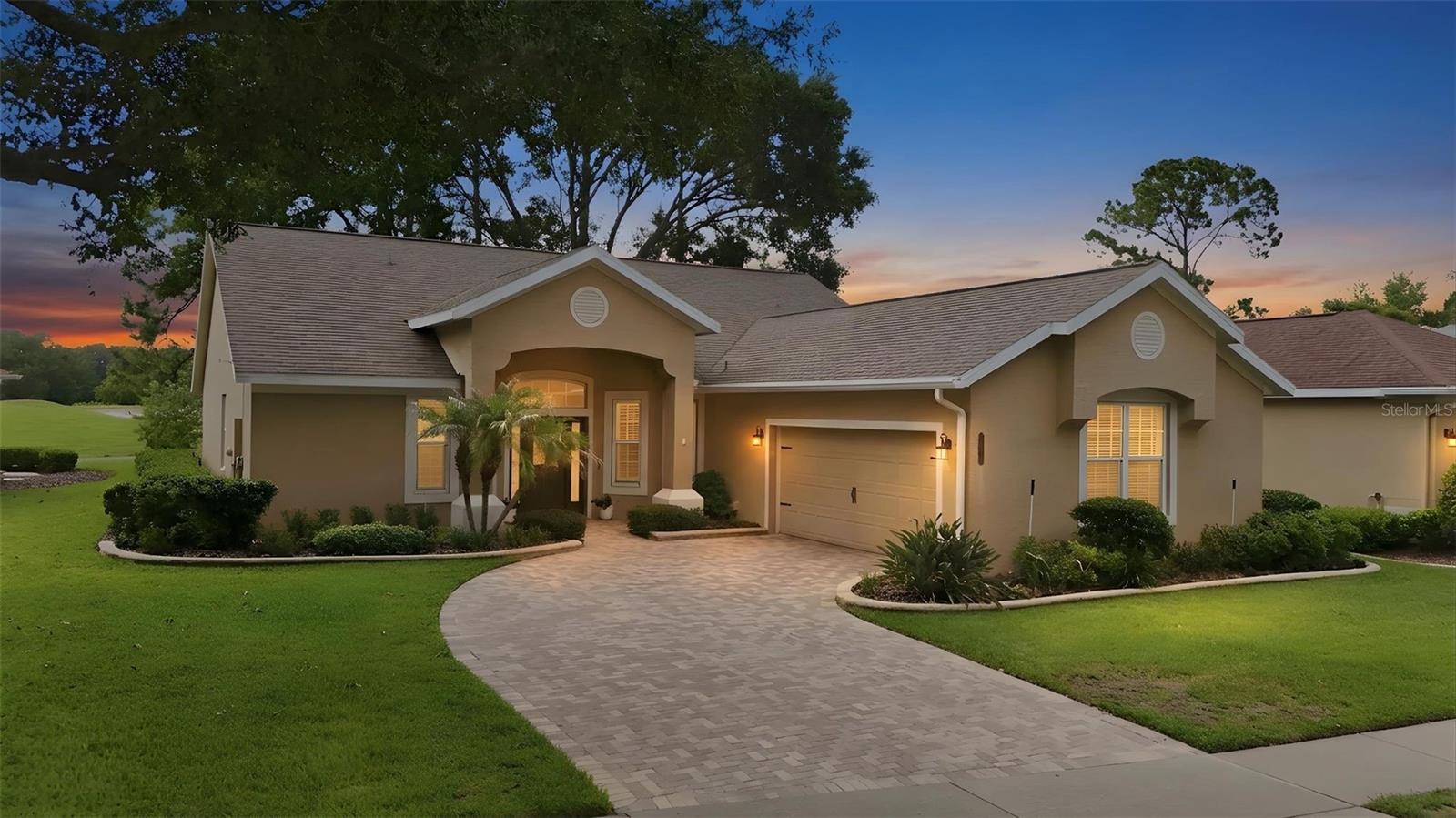 Welcome to the carefree Sunshine State lifestyle you’ve been dreaming of
in The Country Club of Mount Dora, one of Central Florida’s premier golf
communities. Stroll along tree-lined sidewalks while enjoying resort-style
amenities, including an 18-hole championship golf course, community pool
and clubhouse, restaurant and lounge, and courts for tennis and pickle ball.
Whether you’re an avid golfer, social butterfly, or just looking for a peaceful
place to call home, there’s something here for everyone. Just minutes
away, discover the charm of historic Mount Dora, recognized as one of
America’s most beloved small towns. Spend your weekends exploring its
boutique shopping, award-winning restaurants, waterfront marina, art
galleries, festivals, and year-round events that make every season special.
Inside this beautifully maintained home, the open, light filled floor plan
features luxury vinyl plank flooring throughout the main living areas, soaring
ceilings, and expansive windows that frame stunning golf course views.
Perfectly positioned along the 16th fairway, nearly every room offers a
tranquil backdrop that brings the outdoors in. The spacious Kitchen is
designed for both everyday living and effortless entertaining. Warm wood
cabinetry, granite countertops, stainless steel appliances, a built-in
microwave, pantry, breakfast bar, and flexible bonus space create a room
as functional as it is inviting. Retreat to the Owner’s Suite with a walk-in
closet, or relax in the private en suite Bathroom with granite countertops,
dual undermount sinks, plenty of storage, relaxing soaking tub, and
separate glass-enclosed shower. Need extra space? The versatile third
Bedroom could be that home office, gym, or hobby room you’ve always
wanted. Triple sliding glass doors invite you out to the screened, tiled Lanai
and extended pavered Patio, creating the perfect indoor-outdoor living
space. Surrounded by fresh, lush landscaping, it’s an ideal setting for
morning coffee, evening cocktails, or just unwinding. The appeal is
enhanced by custom low-voltage LED landscape lighting that illuminates
plants and architectural details. You’ll enjoy the confidence that comes with
a meticulously maintained home, including a new HVAC system (2023),
Water Heater (2020) and a fresh coat of paint. Not only can you enjoy the
year-round events in “Festival City” you’re CONVENIENTLY LOCATED to
grocery stores, schools, and premium healthcare, and just minutes from the
429 and 414 connectors for a seamless trip to Orlando, Sanford, Winter
Garden, Airports, Beaches, and Attractions. This is more than just a home,
it’s a lifestyle. Schedule your private showing today, before someone else
calls it theirs.