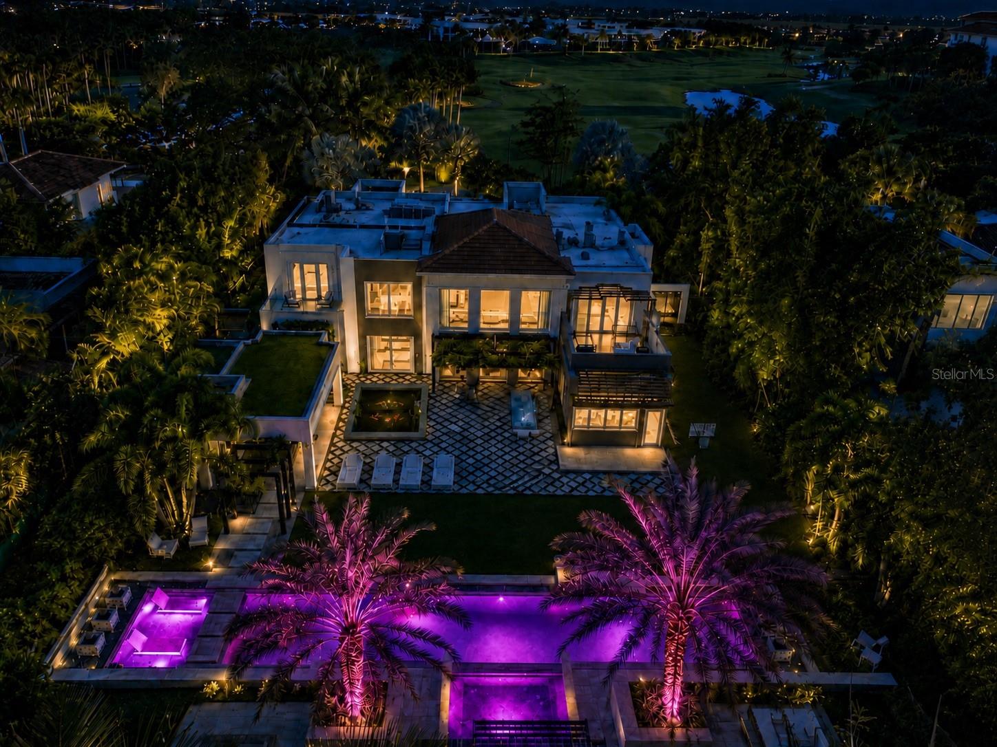 Welcome to the most Prestigious Estate in Dorado Beach East, this one-of-a-kind residence is set on the 7th largest lot in the community, offering rare scale, privacy, and distinction in one of Puerto Rico’s most exclusive coastal enclaves. Just a short walk to the beach, the property features 6 bedrooms, 8.5 baths, approximately 10,351 sq. ft. of living space, and expansive grounds designed for exceptional indoor-outdoor living. With the ability to host 400+ guests on property, this estate is ideal for grand entertaining, private celebrations, and resort-style gatherings at an unforgettable scale. A premier Dorado Beach East address, proximity to world-class resort amenities, golf, beaches, dining, and the estate’s remarkable lot size make this a truly special offering in the Caribbean luxury market. Property details, guest capacity, and lot ranking should be independently verified.