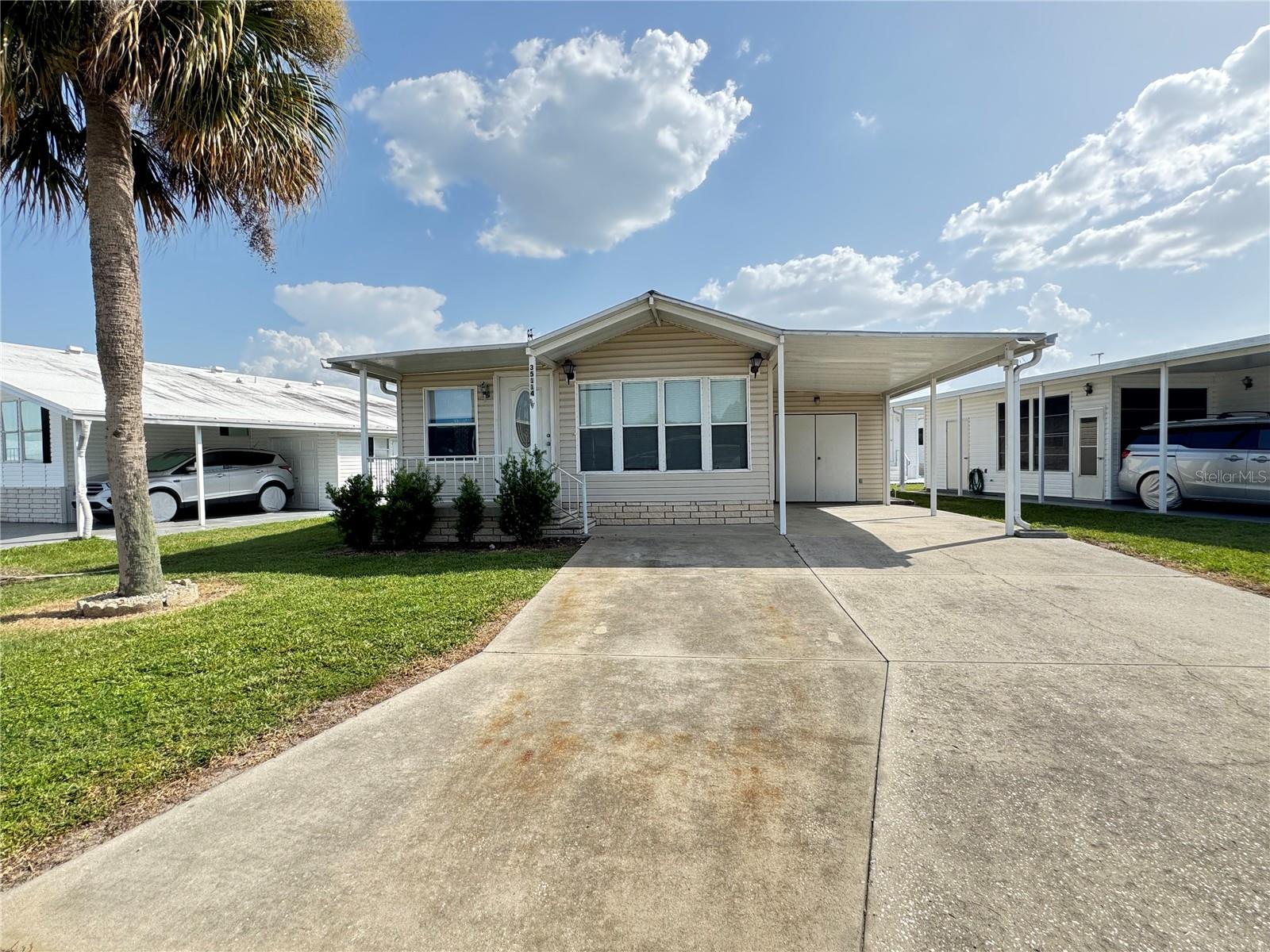 Enjoy easy Florida living in this charming park model home with Florida room located in a welcoming 55+ community designed for an active and social lifestyle.  This well-maintained home offers a comfortable layout that maximizes every square foot, creating a bright and inviting living space perfect for seasonal or year-round living.  The functional floor plan provides a cozy living area, efficient kitchen, comfortable bedroom accommodations and plenty of storage, making it ideal for those looking to downsize without sacrificing convenience.  Relax with your morning coffee or unwind in the evening while enjoying the peaceful surroundings.  American Condominium Parks is a 55+,gated community with heated pool, clubhouse, exercise room, sauna, hot tub, tennis court, pickleball courts, horse shoe pits, duffle board courts and many more amenities.  A friendly, active community with dances, dinners and entertainment.  Perfect for full-time affordable living and cost-effective for snow birds. NO RENT AS YOU OWN THE LAND.  Reasonable monthly fee that maintains the common elements and amenities for your use.  Stop by and take a look at this gem!