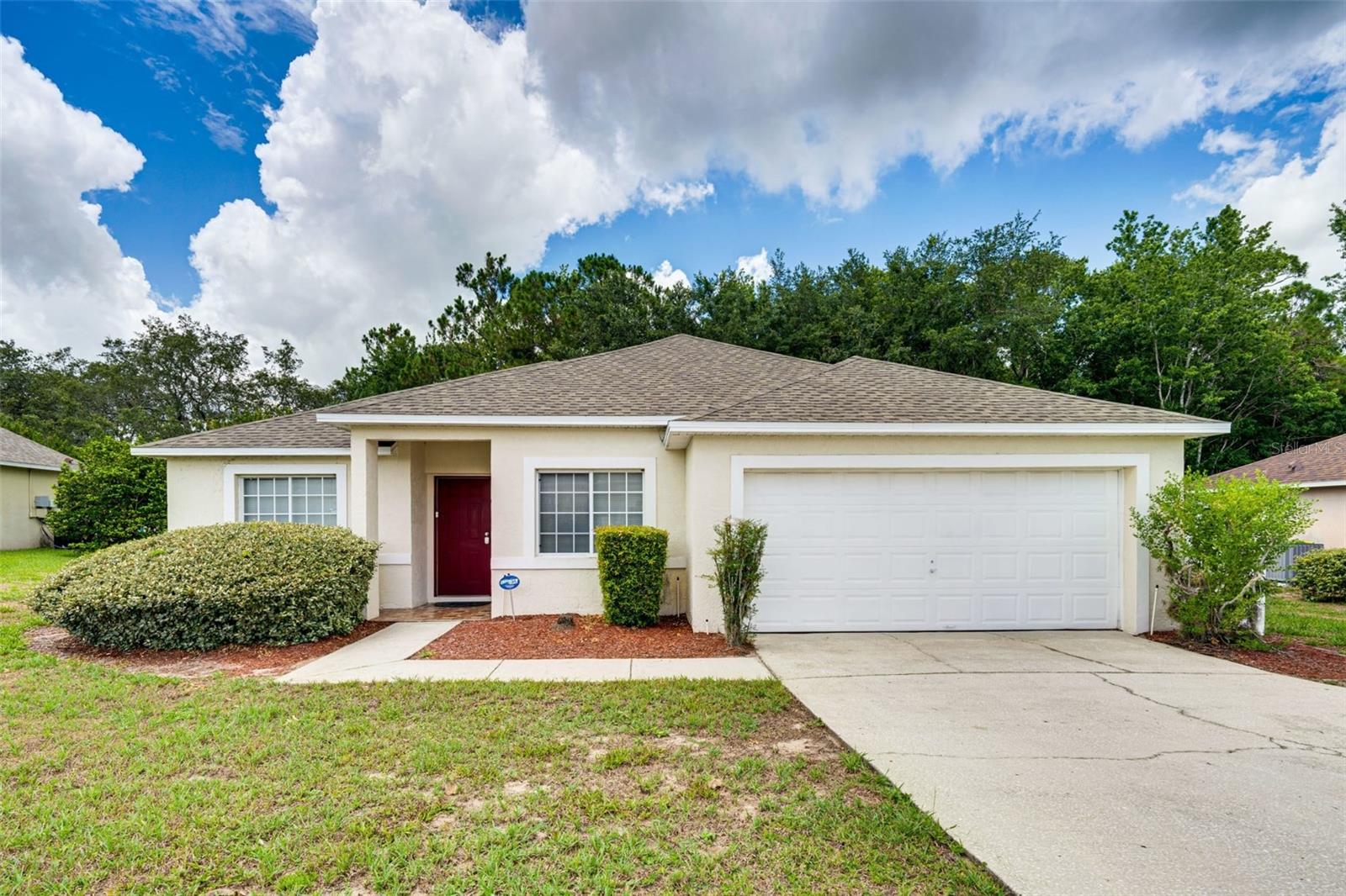 Beautiful, fully furnished, active STR vacation home, single-story 4-bedroom, 2-bath home located just minutes from Walt Disney World and Central Florida attractions. The spacious layout features generously sized bedrooms that provide privacy and flexibility. The kitchen includes an oven, microwave, dishwasher, refrigerator, freezer, and ample counter space for meal preparation, with an adjacent dining area for gathering. The living area offers Smart TVs, and the garage has been converted into a game room with a pool table and foosball. The screened lanai features a heated private pool, outdoor dining area, and outdoor furnishings for year-round enjoyment. Additional features include central heating and air conditioning, ceiling fans, high-speed Wi-Fi, washer and dryer, keyless entry, and ample storage. The home also includes a Pack 'n Play, high chair, and a single-level floor plan. A private neighborhood fishing lake with benches is located approximately one-quarter mile from the property. Conveniently located near shopping, dining, golf courses, Orlando International Airport, Universal Orlando Resort, LEGOLAND Florida Resort, only 9 miles from Disney, and other Central Florida attractions, this home offers comfort, space, and convenience and 5 star guest reviews.