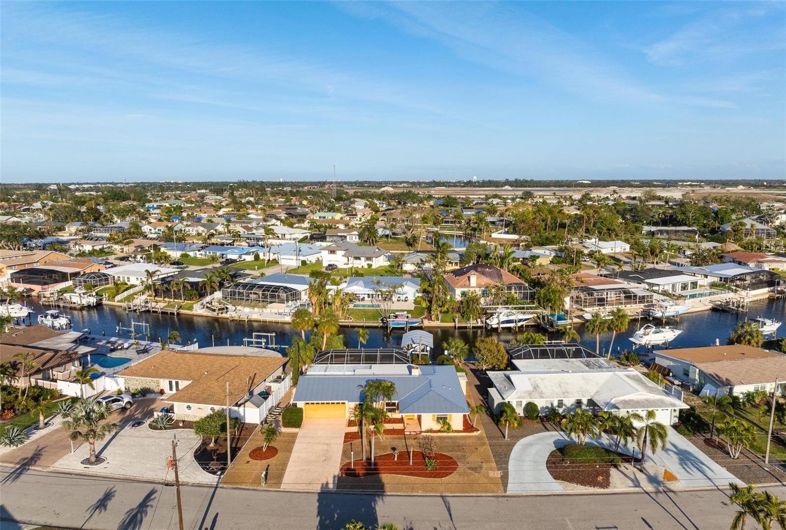NO FLOODING DURING THE LAST HURRICANES!!! 
This canal-front home is a true Bradenton gem, offering the perfect blend of comfort, convenience, and water access. Located just minutes from the world-famous beaches of Anna Maria Island, this property is ideal for boating enthusiasts and beach lovers alike. The spacious backyard features a private pool, perfect for relaxation, and a dock that offers direct access to Sarasota Bay with no bridges—perfect for all your water adventures, from fishing to boating.

Inside, the home is flooded with natural light and boasts an open floor plan with two bedrooms and two bathrooms. The kitchen features a cozy eat-in nook, where you can cook while enjoying views of the pool and canal. The large master suite includes a private ensuite bathroom, while a second bedroom and shared bathroom provide comfortable accommodations for guests. 

This home also benefits from a voluntary HOA fee, offering an added sense of community without the full commitment of a mandatory fee.

Step outside to the expansive pool area, complete with a covered lanai, sunny lounge space, and beautiful canal views. The property also includes a large driveway with plenty of parking space for all your guests and water toys.

Whether you're seeking a primary residence, a second home, or an investment property with vacation rental potential, this is the perfect choice. Enjoy a peaceful waterfront lifestyle, just minutes from pristine beaches, shopping, and dining. Don’t miss out on this opportunity—book your showing today!