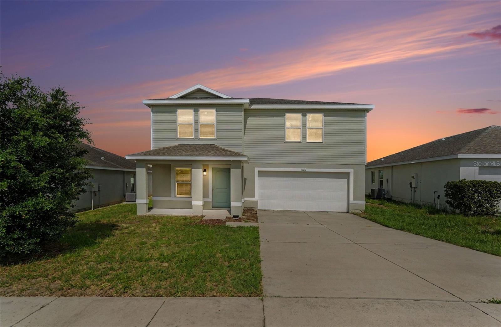 Welcome to this 4-bedroom, 2.5-bathroom home situated in the Sand Ridge neighborhood. This residence features a classic traditional floor plan that provides dedicated, well-defined spaces for comfortable living. The inviting living area is centered around a cozy fireplace, creating a warm atmosphere for everyday relaxing. The kitchen is designed with practical laminate countertops and is outfitted with a modern mix of black and stainless-steel appliances. The primary bedroom serves as a private retreat, complete with a large walk-in closet and an attached primary bathroom featuring a double-sink vanity. Location is everything with this property. You are situated roughly 15 minutes from the Veterans Expressway for quick Tampa access, and about 45 minutes from Tampa International Airport. For outdoor recreation, you are just minutes away from nature outings like  Springs, Linda Pedersen Park, Pine Island Beach, and local preserves offering scenic trails and kayaking. Schedule your private showing today!
