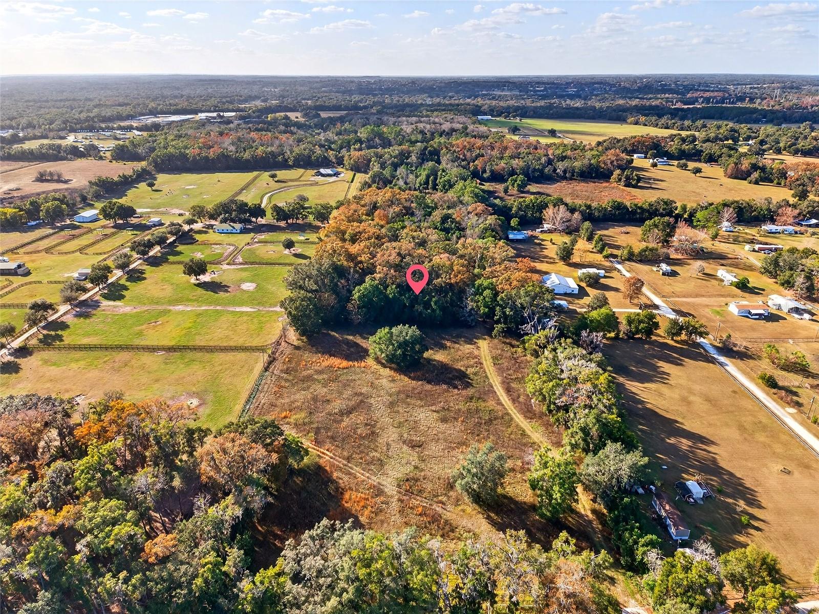 21.07 ACRES, NOT IN A FLOOD ZONE AND ZONED A-1. 2 PARCELS BEING SOLD TOGETHER 12747-004-00 11.01 ACRES AND 12747-004-02 10.07 THAT ARE CONTIGUOUS TO EACH OTHER WITH 417 FEET OF ROAD FRONTAGE. WOULD BE GREAT FOR FARM WITH CUSTOM BUILT BARN AND HOME. WE HAVE A GENERAL CONTRACTOR THAT CAN ACCOMODATE ANY BUILD, BARN,ARENA WITH GGT FOOTING AND FENCING. FOR THOSE PRICES AND  SITE PLAN, PLEASE CONTACT US. JUST OFF OF HIGHWAY 441 WITH PAVED, EASY ACCESS TO BACKROADS TO THE WORLD EQUESTRIAN CENTER BEING 20 MINUTES AWAY!