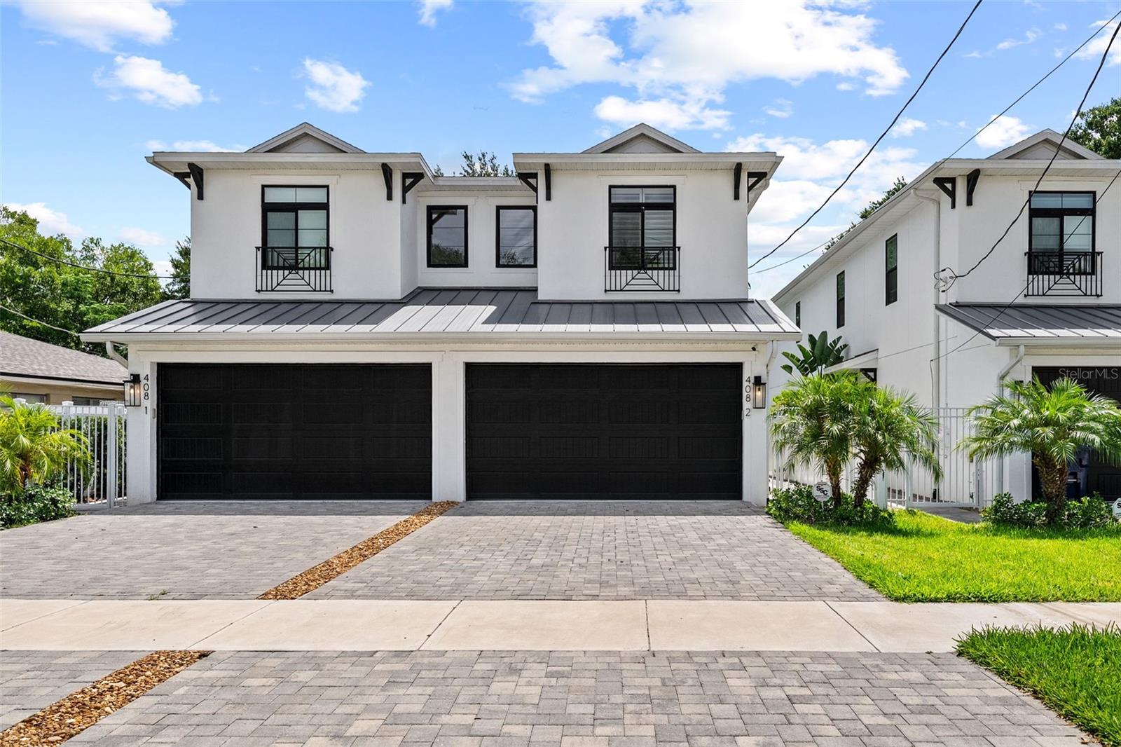 This like-new South Tampa residence offers a rare blend of thoughtful design, elevated finishes, and private outdoor living, all tucked behind a fully fenced and private gated entry with no HOA fees. Located in the heart of
South Tampa, this single-family attached home lives like a true retreat, offering convenience and privacy in one beautiful package. From the moment you arrive, the home’s inviting presence sets the tone. Every space has
been intentionally designed with style and function in mind. Downstairs a dedicated first-floor office offers the flexibility to serve as a work-from-home space, playroom, or den. At the heart of the home, the chef’s kitchen
seamlessly anchors the main living space. Custom cabinetry, under-cabinet lighting, white quartz countertops, a farmhouse sink, walk-in pantry, wine refrigerator, and premium Viking appliances - including a gas cooktop
- create a space that is as beautiful as it is functional. From there, the kitchen opens naturally into the light-filled dining and great room, where the open-concept design creates an easy flow for both everyday living and
effortless entertaining. Outside, a fully fenced backyard offers endless possibilities for a future plunge pool, fire pit, play set, or custom outdoor entertaining area. The covered lanai is already plumbed for a future outdoor
kitchen, creating the perfect backdrop for al fresco dinners, weekend gatherings, or quiet evenings at home. Upstairs, an airy loft provides flexible bonus space, perfect for a cozy lounge or reading nook. The primary suite
is a true sanctuary, complete with dual custom walk-in closets and a spa-like en-suite bath, featuring double vanities, a private water closet, and an oversized walk-in shower with a rain showerhead. Two generously sized
guest bedrooms and a beautifully appointed shared bath offer plenty of space for family or visitors, and a spacious laundry room, complete with cabinetry and a utility sink, adds everyday convenience exactly where it’s
needed. Other features include wide-plank white oak flooring throughout, designer tile in all wet areas, impact-rated windows, and a tankless gas water heater. Located within the highly sought-after Mitchell, Wilson, and
Plant school district, just minutes from Hyde Park Village, SoHo, Water Street, Downtown Tampa, Tampa International Airport, and our beautiful Gulf Coast beaches this home offers the best of South Tampa living!