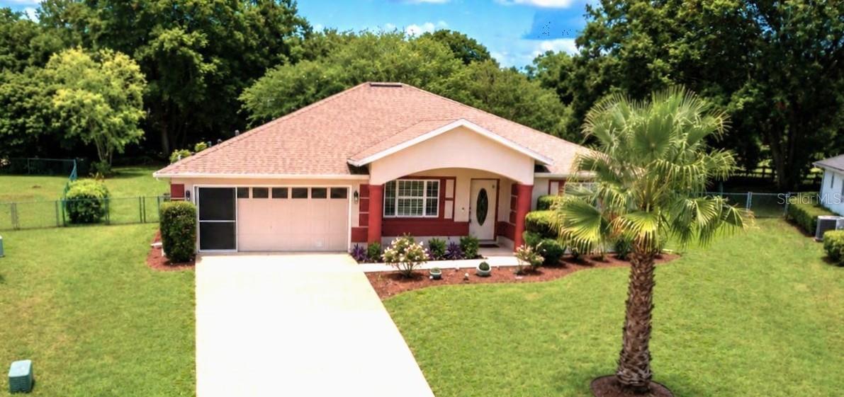 Welcome home to this beautifully updated 3-bedroom, 2-bath home located in the 55+ community of Cherrywood Estates. Built in 2001 and situated on one of the largest lots in the community, this property offers the perfect blend of comfort, space, and Florida living at its finest.  Step outside and discover your own private oasis featuring a screened-in, in-ground saltwater pool with solar heat—ideal for year-round relaxation, entertaining, or enjoying sunny Florida afternoons. Inside, the split floor plan welcomes you with two guest bedrooms and a guest bath conveniently located near the front of the home, offering comfort and privacy for visitors. The guest bath features a beautiful quartz vanity, creating a stylish and functional space. Continue through the home and fall in love with the beautifully updated kitchen, complete with stainless steel appliances, stunning quartz countertops, and plenty of space for meal prep and gathering. The formal dining area sits just off the kitchen, making entertaining effortless, while the nearby living room provides the perfect place to unwind after dinner.  The spacious primary suite offers an ensuite bath featuring dual sinks with quartz countertops, a large soaking tub, and a separate shower—giving you the perfect choice for relaxation at the end of the day.  Conveniently located near State Road 200, you’ll enjoy easy access to shopping, dining, churches, and everyday conveniences. Looking for adventure? Crystal River is less than an hour away and is famous for its manatees, springs, and seasonal scallop fishing.  Cherrywood Estates offers an active lifestyle with exceptional amenities, social clubs, and activities designed to match a variety of interests. Whether you’re relaxing poolside, making new friends, or exploring all that Central Florida has and the lifestyle you’ve been waiting for.  Private tours available, just a phone call away!