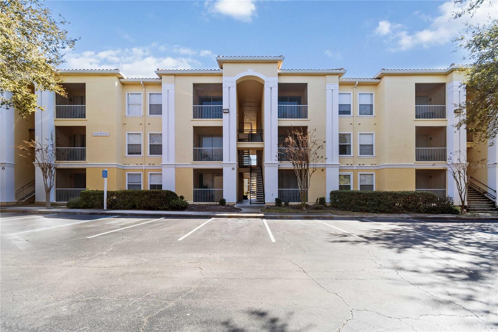 One or more photo(s) has been virtually staged. Water views, brand-new mechanicals, and the best price in the building. This 1-bedroom, 1-bath condo at Visconti is offered at $9,000 less than the only comparable unit in the same building — and comes with a new Goodman 2-ton, 14.3 SEER HVAC system (2025), new water heater with expansion tank (2026), and a refreshed kitchen featuring new shaker cabinets (2025), representing over $15,000 in recent improvements. Enjoy peaceful pond views from your private balcony and bedroom, accessed through a large sliding glass door off the open living area, which features built-in shelving and a bright, functional layout. A separate laundry room adds everyday convenience. Residents enjoy two resort-style pools, a fitness center, a clubhouse, and sports courts in a gated community where HOA fees include trash, water, and sewer. Minutes to I-4 with easy access to downtown Orlando, Winter Park, Walt Disney World, Universal, and Orlando International Airport. Ideal for first-time buyers, those right-sizing, or investors seeking a low-maintenance rental. Mortgage savings may be available for buyers of this listing.