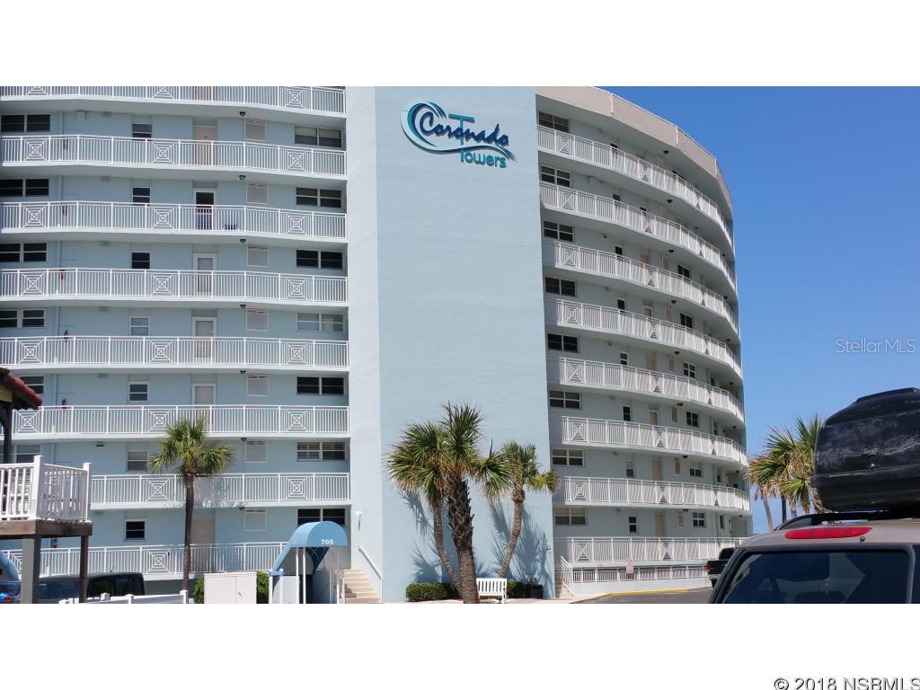 Fully furnished direct ocean front unit. Direct views of both the ocean and the pool. This unit is so cute and comfortable and fully outfitted with everything one would need to move right in and start living or renting for income. This is one of the rare units with full size washer and dryer in the unit (most condos beach side have shared laundry rooms). Master bedroom has on-suite full master bath. Second bedroom is outfitted with two queen beds which fit comfortably. Flat screen, wall-mounted TV's in living room and master. Beds, and A/C unit replaced in late 2015. Very well maintained unit with cute furniture. Private lockable storage for each unit in the basement plus also open common storage for bikes, paddle boards etc. Basement also has a common area with couches, TV, pool table. ;LocationDescription: Condo ;Water: City