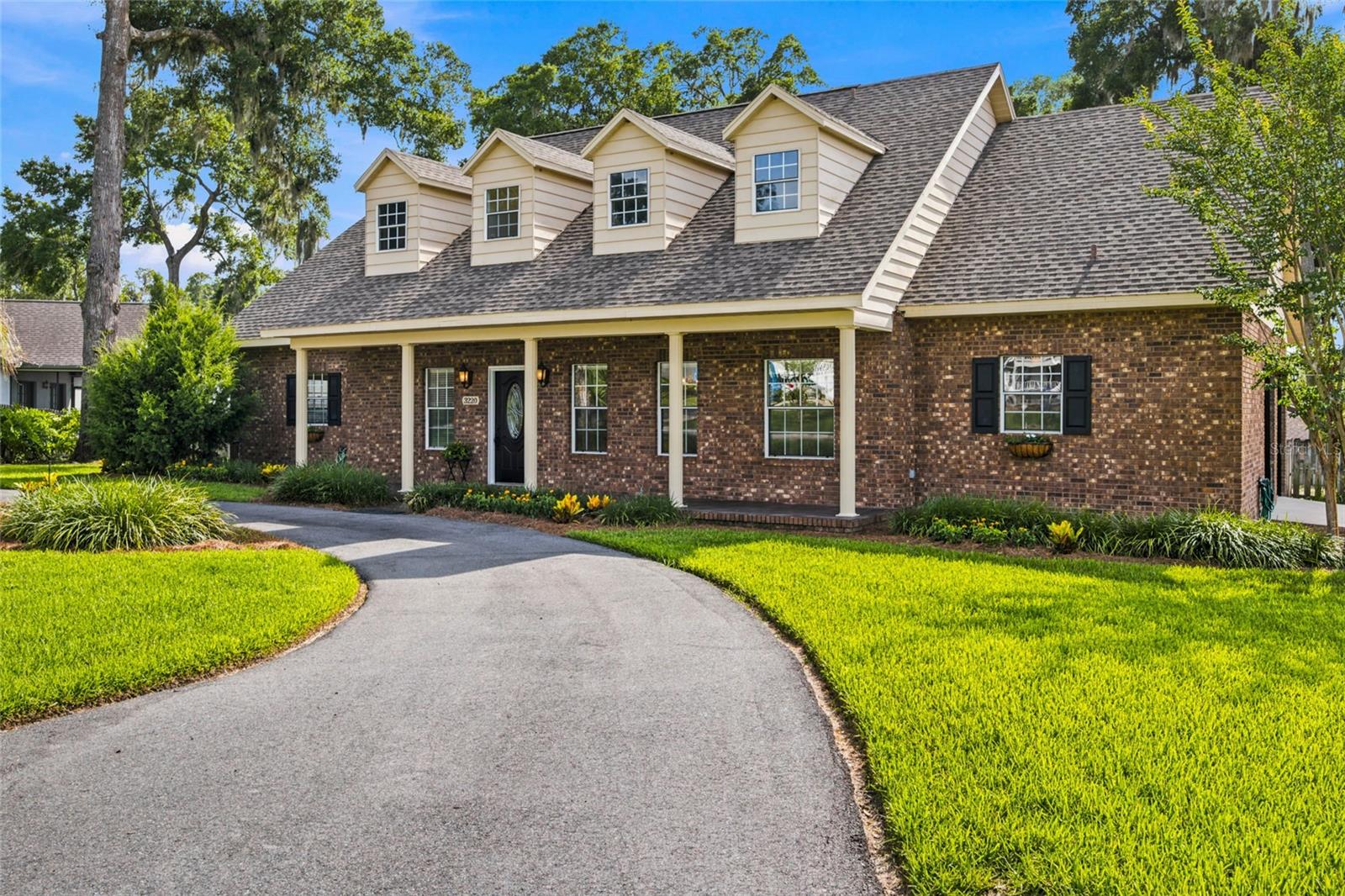 Rare Southeast Ocala opportunity offering space, updates, flexibility, and true move-in condition! This beautifully maintained 4-bedroom, 3 bath home offers approximately 3,000 heated square feet, including a finished upstairs media/bonus room under heat and air - perfect for movie nights, game space, office, guest overflow, or a private retreat. The home also features both upstairs and downstairs A/C units, providing comfort and efficiency for the home’s spacious two-level layout. From the moment you enter, pride of ownership is obvious. The home is clean, bright, spacious, and thoughtfully cared for, with tile, engineered hardwood, and carpeted bedroom/bonus spaces creating a warm and practical layout. Major improvements give buyers peace of mind, including a new roof in 2021, Lennox A/C in 2024, bathroom remodel in 2023, and a substantial kitchen remodel in 2006 with approximately $55,000 invested, per owner. The kitchen offers great function and opens naturally to comfortable living and dining spaces, making the home ideal for both everyday living and entertaining. A unique photography dark room with sink adds even more versatility and can easily serve as a craft room, hobby space, art room, wrapping station, or creative workspace. Enjoy a private pool, fenced/landscaped yard, fireplace, 2-car attached garage, and a desirable Southeast Ocala location close to schools, shopping, dining, medical, downtown Ocala, and major conveniences. Homes with this combination of size, condition, updates, pool, location, and flexible living space are hard to find at this value. Schedule your private showing today — this is the one buyers will remember.