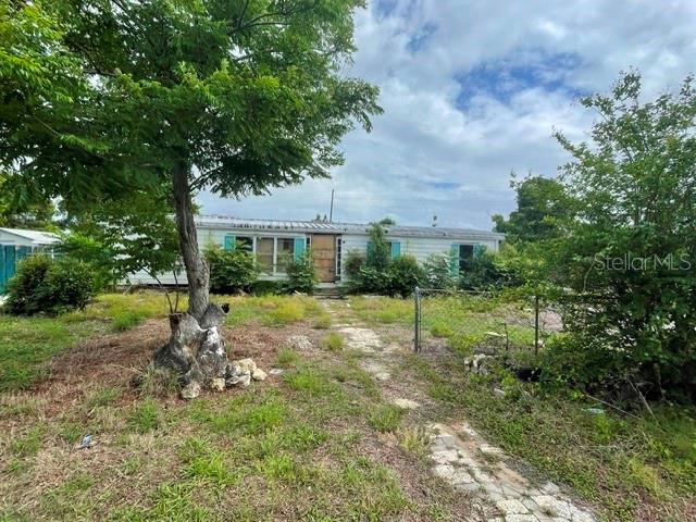 INVESTOR SPECIAL – FIXER UPPER WITH MASSIVE POTENTIAL! Opportunity knocks on this oversized .38-acre corner lot featuring three separate structures and endless possibilities! Whether you’re an investor, flipper, contractor, or someone looking for a property with space to create your vision, this one deserves a look. The manufactured home offers an expansive layout with 3 bedrooms, 2 bathrooms, a split floor plan, and formal dining area, but it is currently down to the studs and will require a full rehab or possible replacement. Bring your imagination and either replace or transform this property into something special. A standout feature is the detached storage building with attached garage located southwest of the home, offering covered parking space for multiple vehicles, workshop potential, storage, or hobby space. There’s also an additional storage building on the east side of the property that could be restored for even more functionality. Cool off during those hot Florida days in the private pool, which also needs work but could become an amazing backyard centerpiece with some TLC and vision. Situated on a large corner lot with paved road access on two sides and NO HOA, this property offers flexibility that’s hard to find. Possible home business opportunity, room for toys, equipment, boats, trailers, or future improvements. The possibilities truly are endless! Please note: there is currently a significant amount of debris and personal property on-site; however, the owner is exploring options to have the property cleaned out and much/all of the debris removed. Property is being sold completely AS-IS with no repairs or warranties expressed or implied. Cash only. Don’t miss your chance to unlock the potential of this unique property that is priced to sell — schedule your private showing today!
— Al Spry The Realtor® Guy