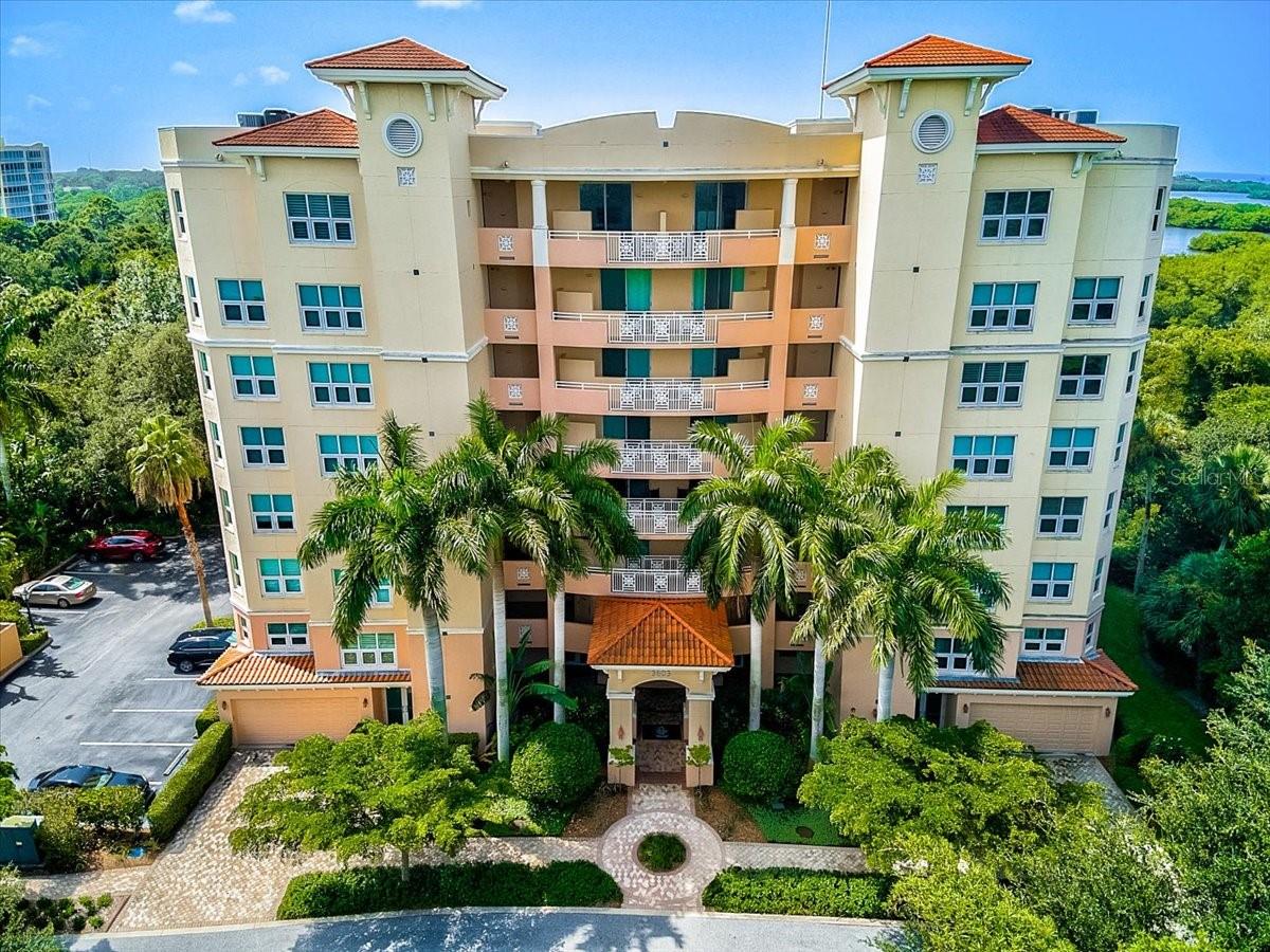 **ELEGANT and SPACIOUS CORNER CONDO UNIT – NEARLY 3200sf – With MULTIPLE BALCONIES** found behind the gates of the highly sought after Oaks-Preserve neighborhood.  This Light and Bright Open Floorplan offers 3 En Suite Bedrooms, 3 Baths, 2 assigned Parking spaces including 1 under building, Climate-controlled storage and much more!  Crown moldings, engineered hardwood floors, expansive kitchen with granite counters and stainless steel appliances are among the many beautiful appointments throughout this impressive residence.  A Serene and Private Preserve setting may be enjoyed from multiple screened balconies -- with extra feature of automatic (remote controlled) hurricane shutters.  NEW(er) HVAC (2021).  This NEWEST Tower (built in 2007) in the Meridian Condo Complex features Hurricane Impact Windows and Doors and is conveniently located next door to the condo residents’ private Amenity Center featuring Heated Pool & Spa, Fitness Room and outdoor grill in addition to The Oaks Club’s main campus of amenities.  THE OAKS is a distinguished country club community which boasts many accolades including: Platinum Club of America, Emerald Club of the World and Elite Distinguished Club of the World - where amenities include two, 18-hole championship GOLF courses, award-winning TENNIS program with 12 Har-Tru Hydro-Grid TENNIS courts, 4 PICKLEBALL Courts, wonderful CROQUET facility, state-of-the-art FITNESS center and junior Olympic, heated community SWIMMING POOL. The Oaks is just minutes from nationally ranked Pine View School, the Legacy Bike Trail, area Beaches and all that Gulf Coast living has to offer. Membership is required and there is NO WAITLIST for GOLF or SOCIAL Membership. **MUST SEE**