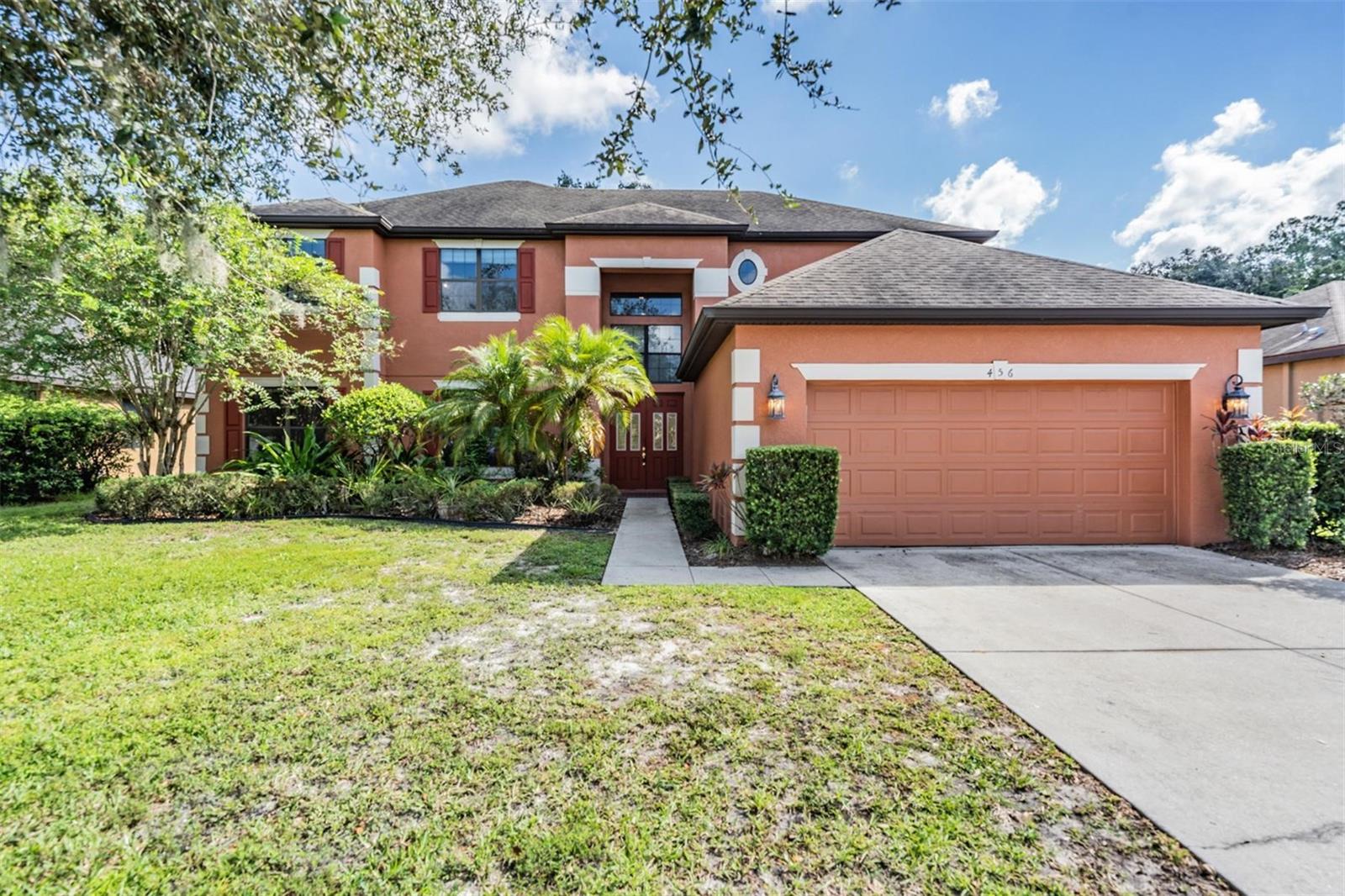 RECENT PRICE IMPROVEMENT! Welcome to this stunning 5-bedroom, 3-bathroom, 4,126 sq. ft. pool home designed for both elegance and comfort while being located in desirable gated community. The saltwater pool with spa, screened-in porch, and private balcony create the perfect setting for outdoor relaxation while overlooking the serene conservation views.  Inside, you’ll find a thoughtfully designed two-story layout featuring a first-floor master suite with a walk-in closet, formal living and dining room, and a spacious kitchen with breakfast nook that opens to a cozy family room with expansive sliding doors to the pool.  Upstairs offers three bedrooms, a family room, and a large game/flex room that can easily be converted into a 6th bedroom if desired. The home also includes a 2-car garage, indoor laundry/utility room, and dual staircases for convenience.  Perfect for entertaining or family living, this home blends functionality with luxury in a private backyard oasis.  Enjoy the convenience of being just a golf cart ride to the grocery store while still tucked away in a secure, tranquil setting.
